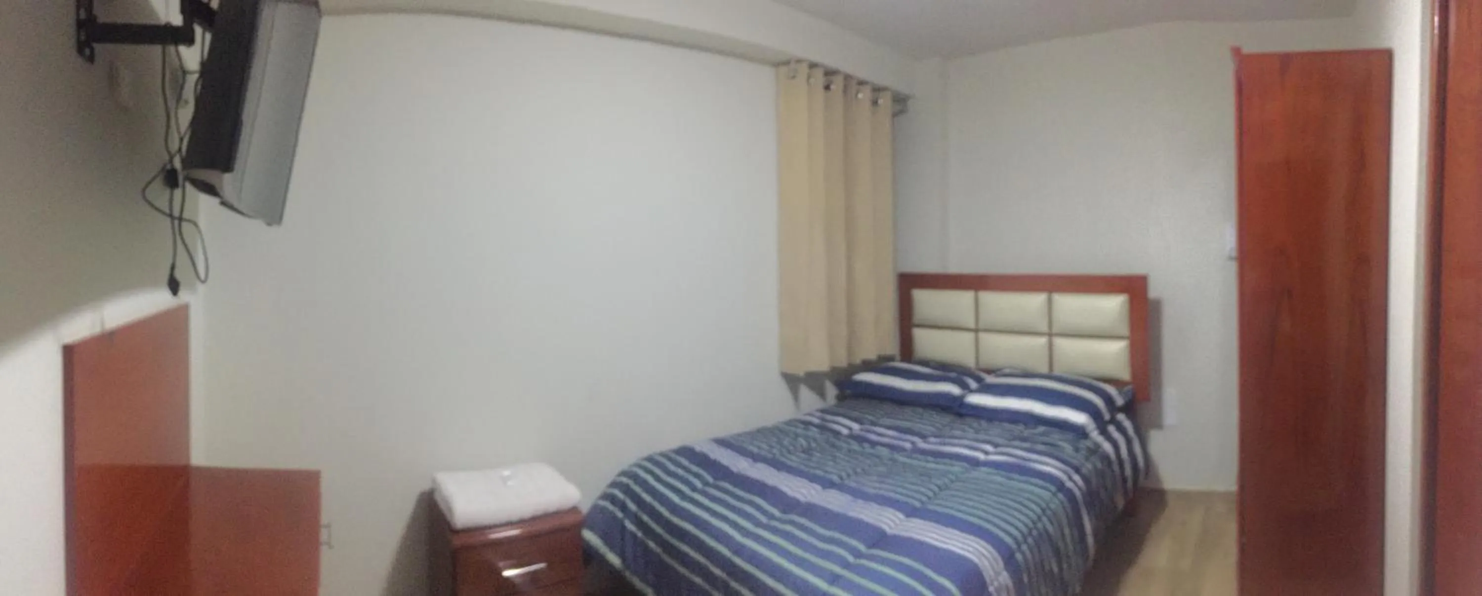 Bed in A-Hope Suite Hotel