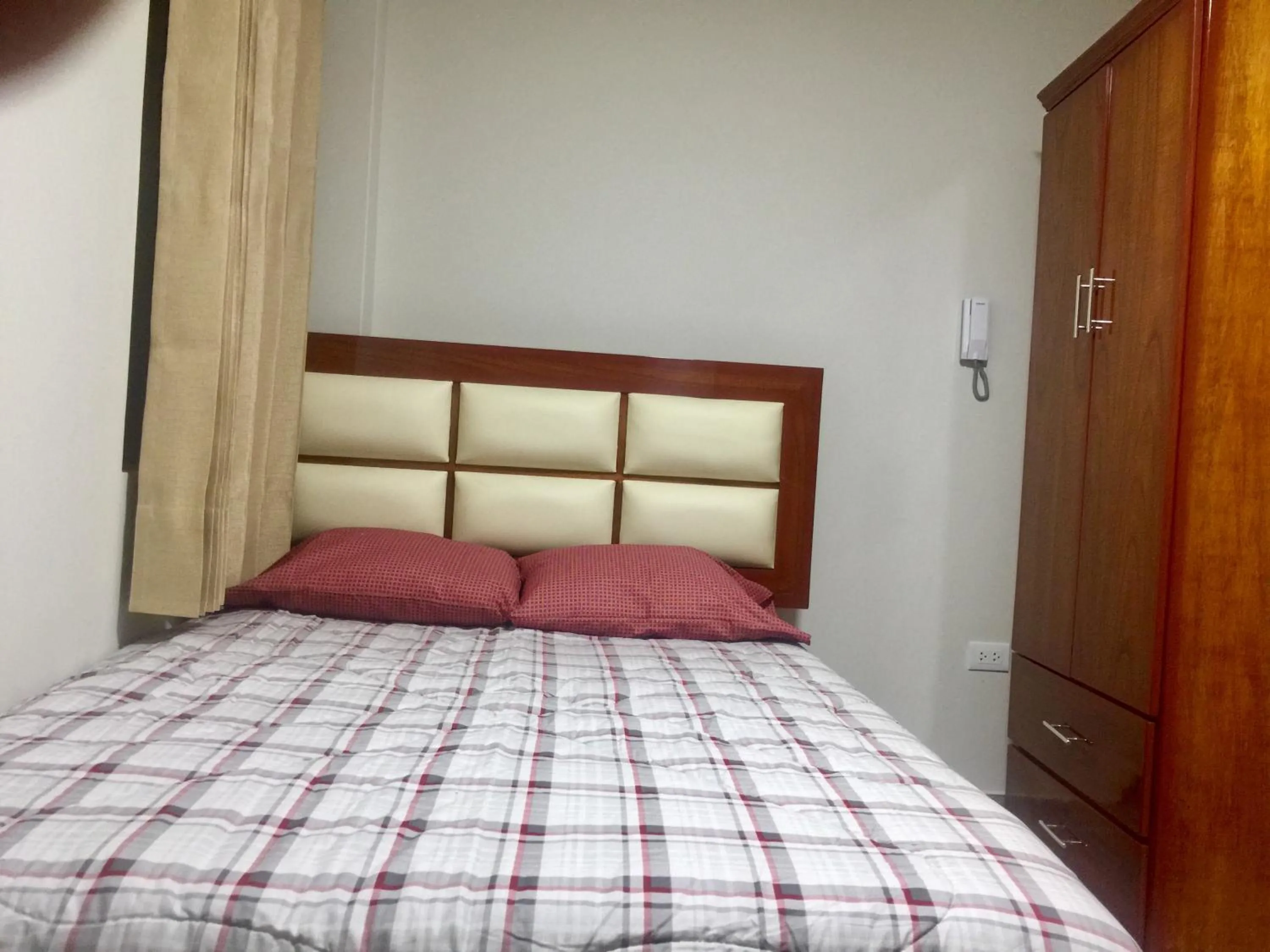 Bed in A-Hope Suite Hotel