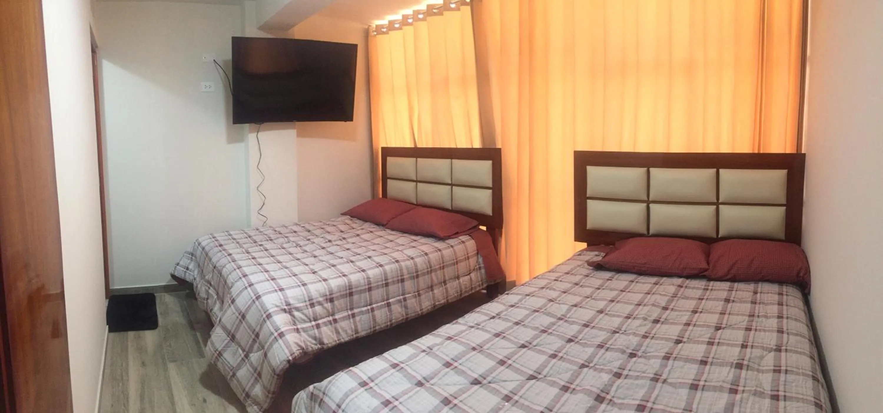 Bed in A-Hope Suite Hotel