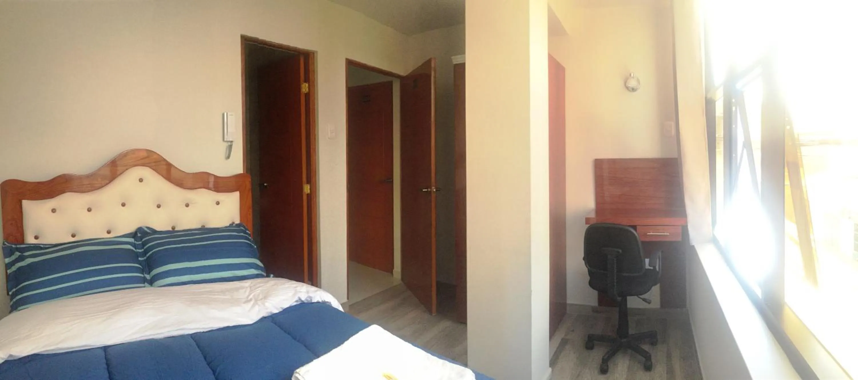 Bed in A-Hope Suite Hotel