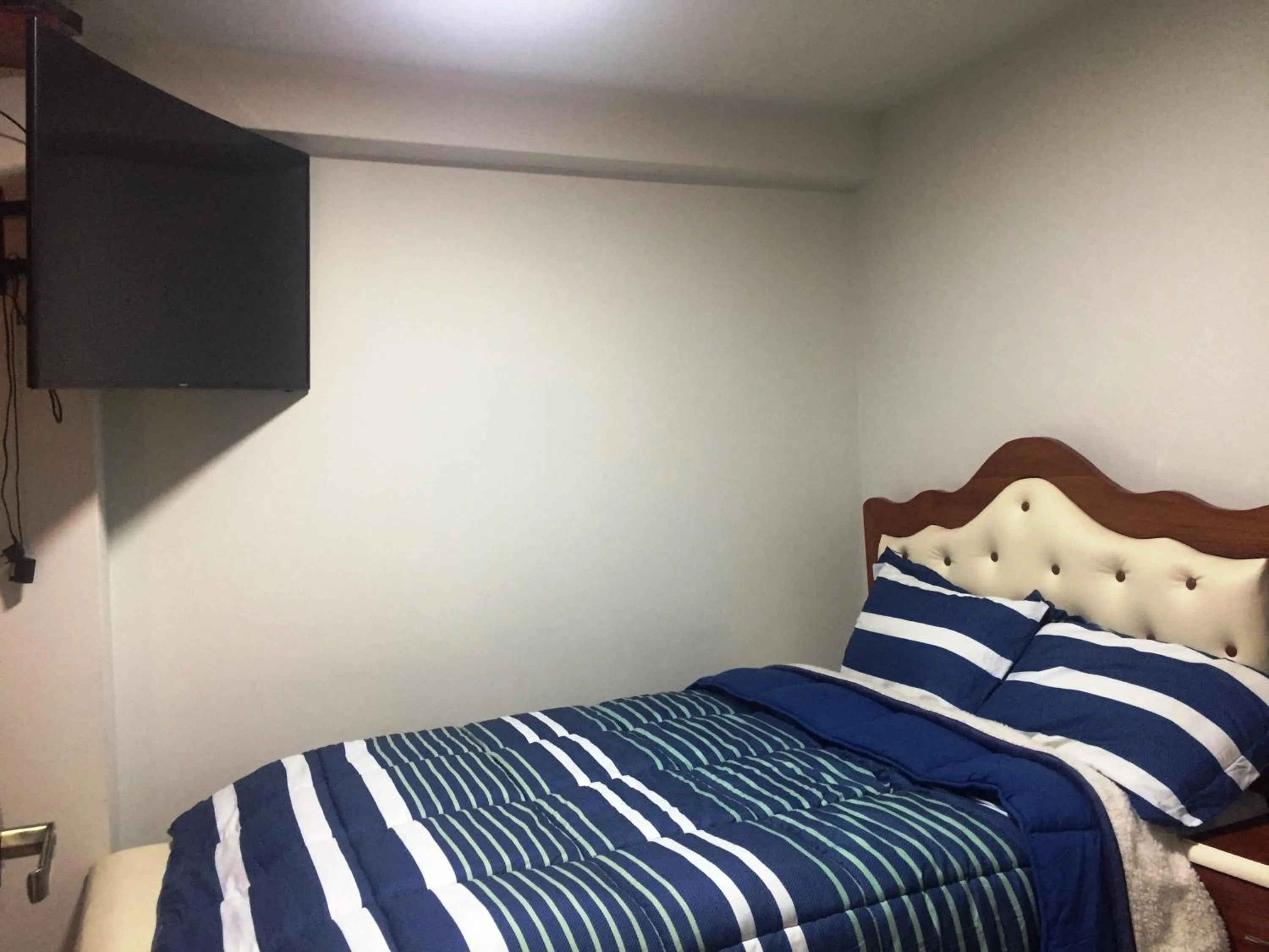 Bed in A-Hope Suite Hotel