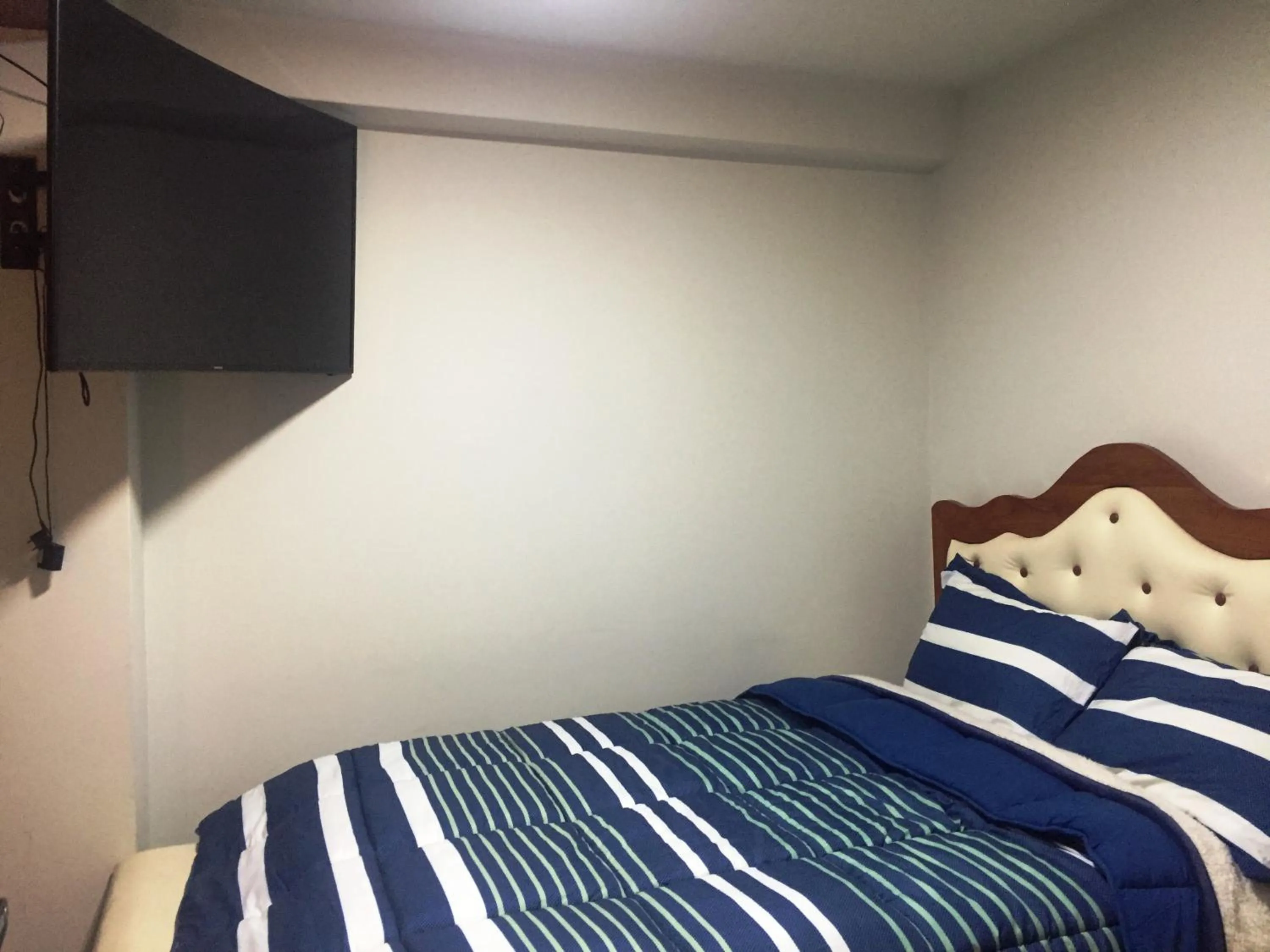 Bed in A-Hope Suite Hotel