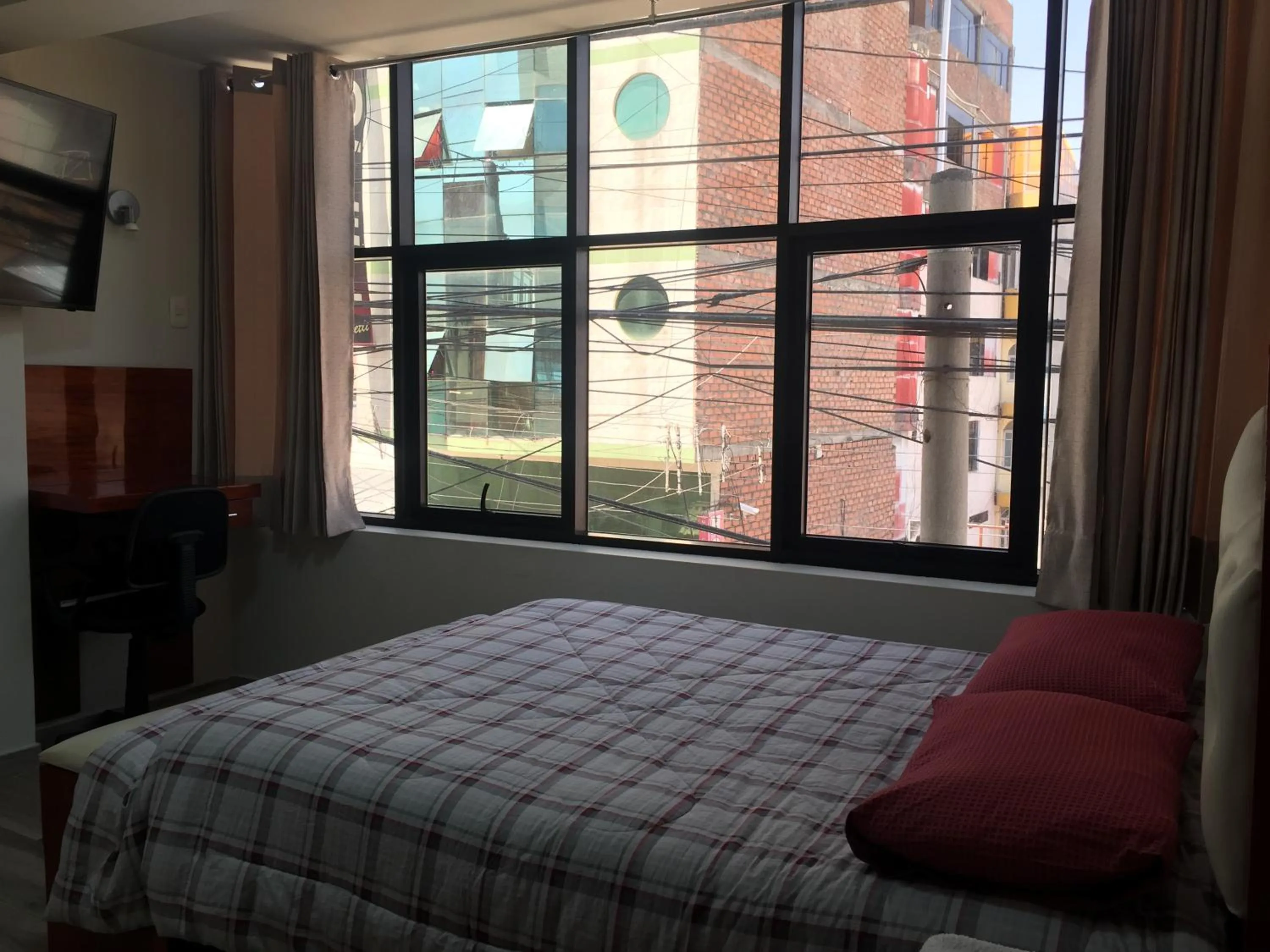 Bed in A-Hope Suite Hotel