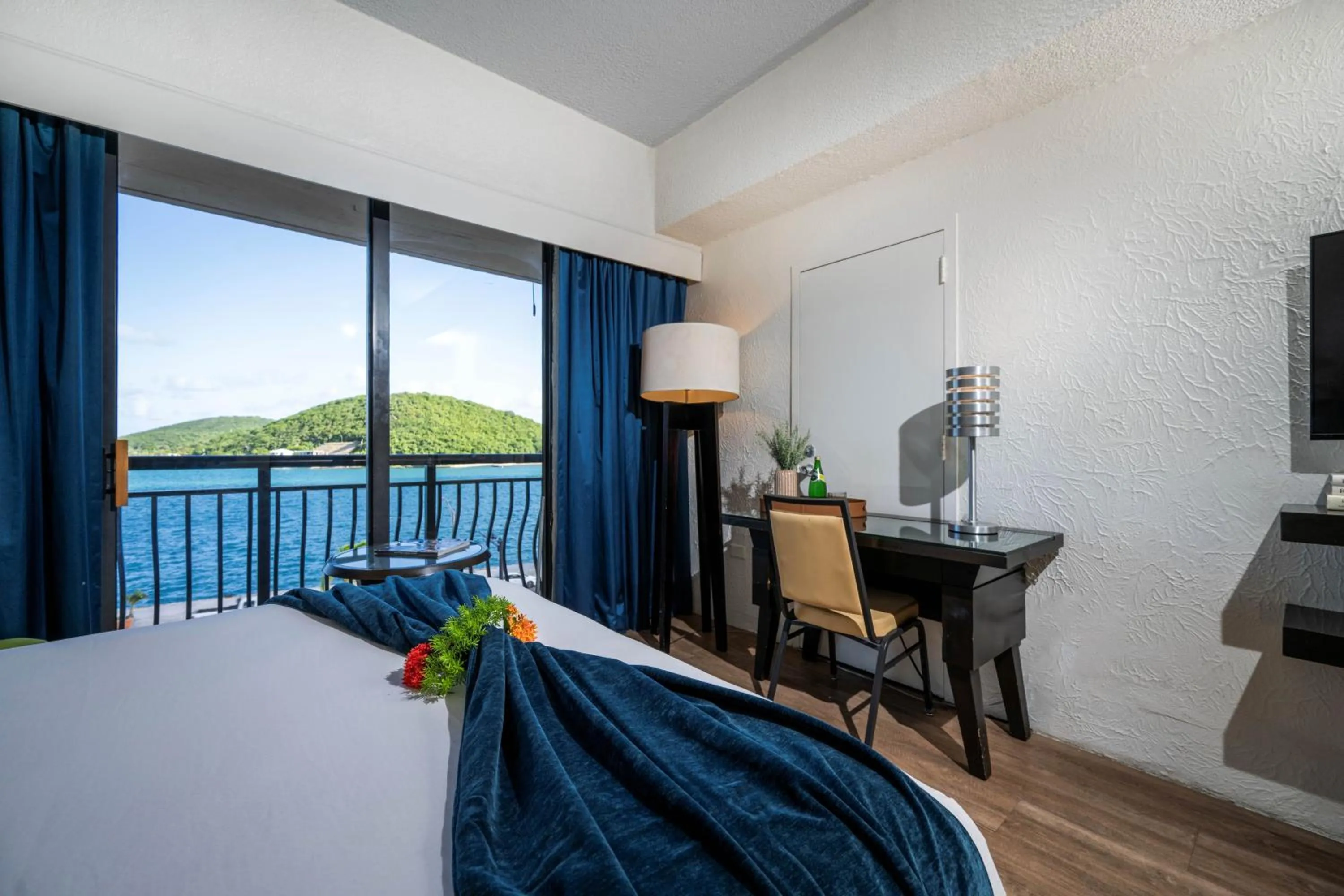 Bed in Windward Passage Hotel