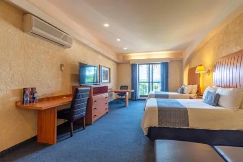 Bed in Hotel Flamingo Inn