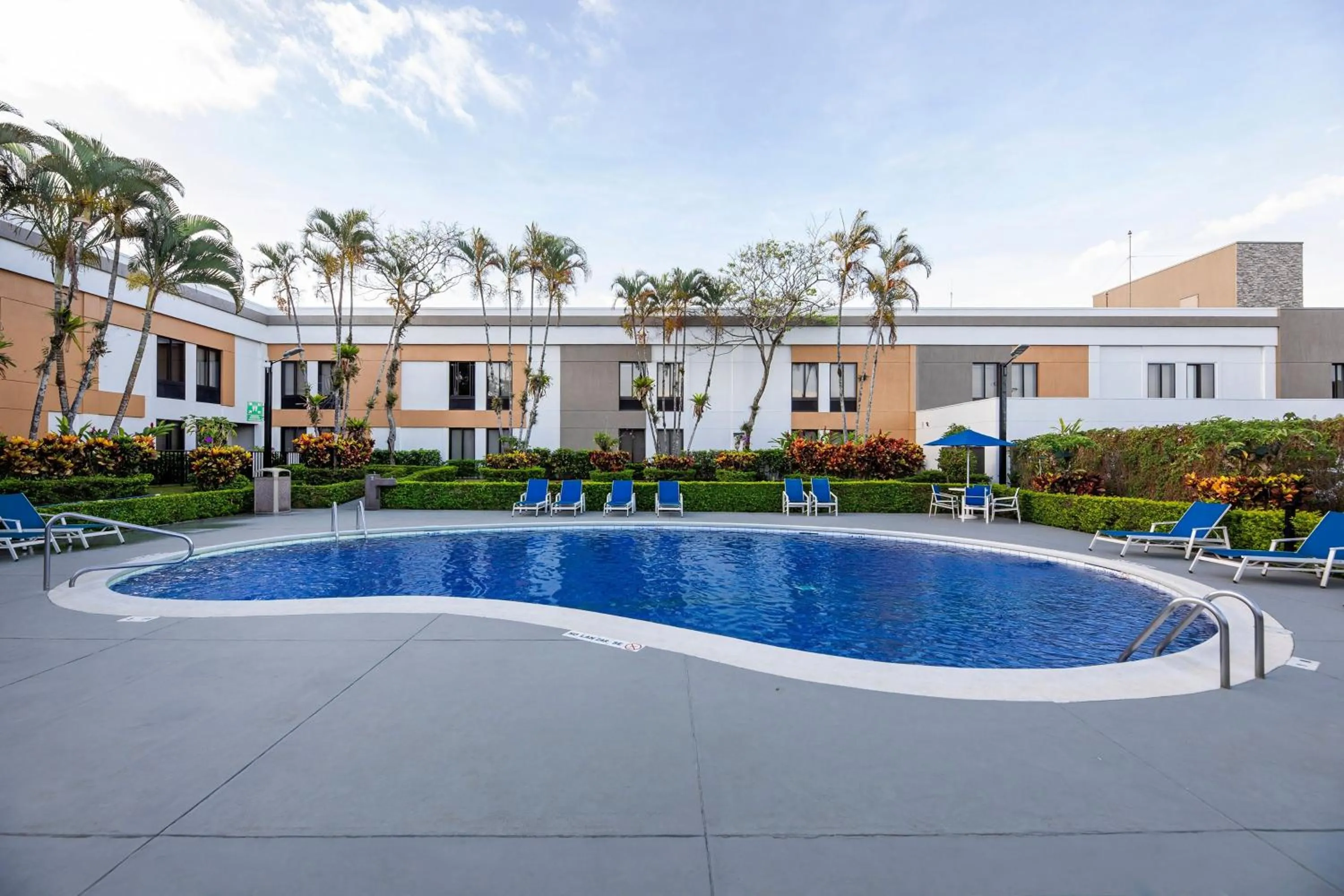 Swimming pool in Holiday Inn Express San Jose Costa Rica Airport by IHG