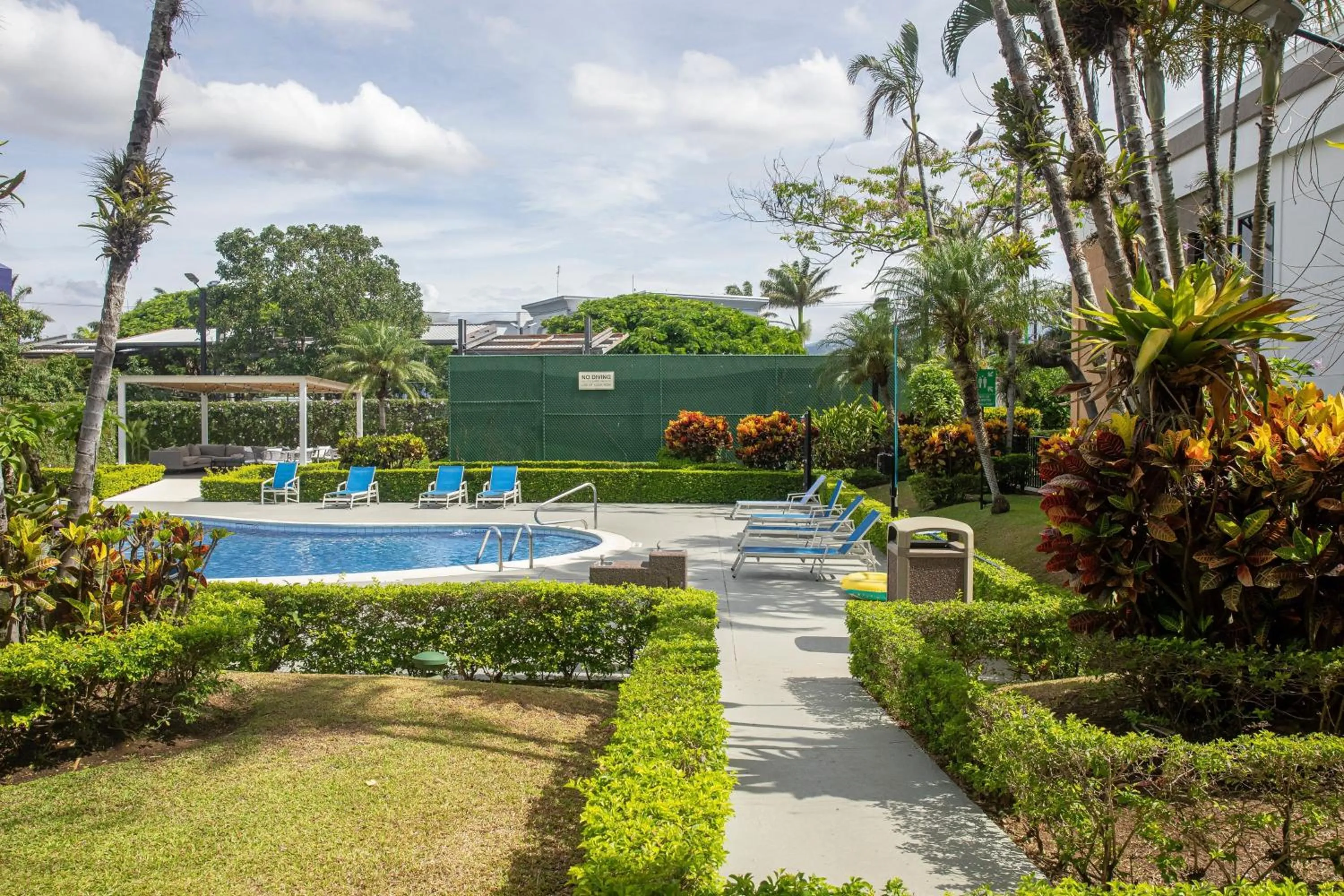 Swimming pool in Holiday Inn Express San Jose Costa Rica Airport by IHG
