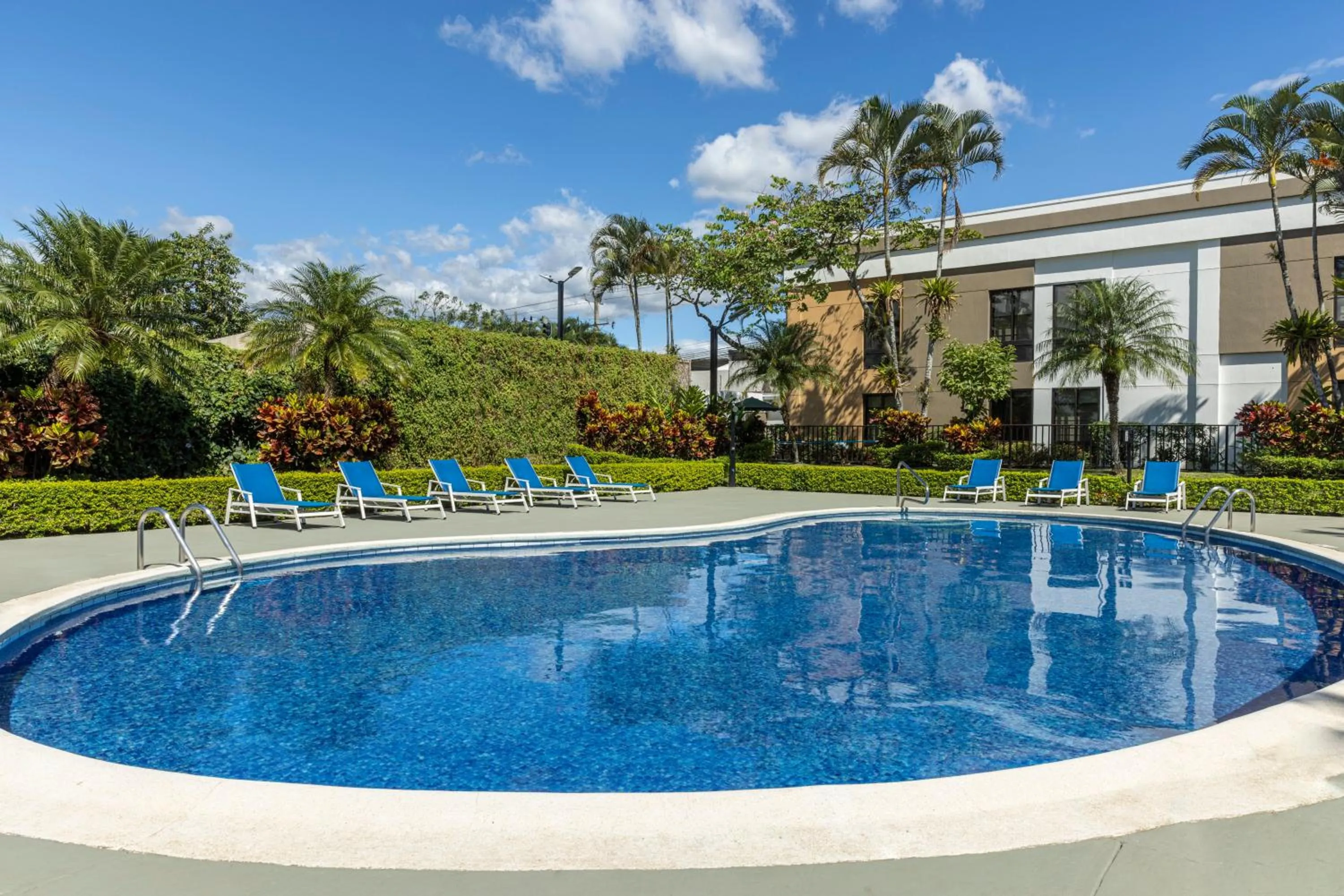 Swimming pool in Holiday Inn Express San Jose Costa Rica Airport by IHG