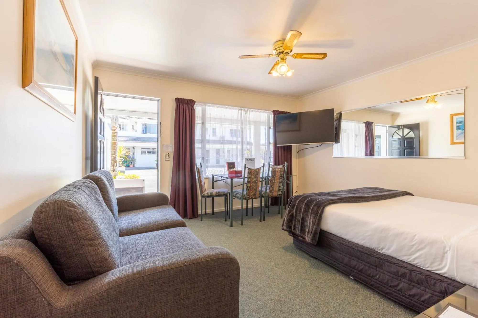 Bed in ASURE PRINCE motor lodge