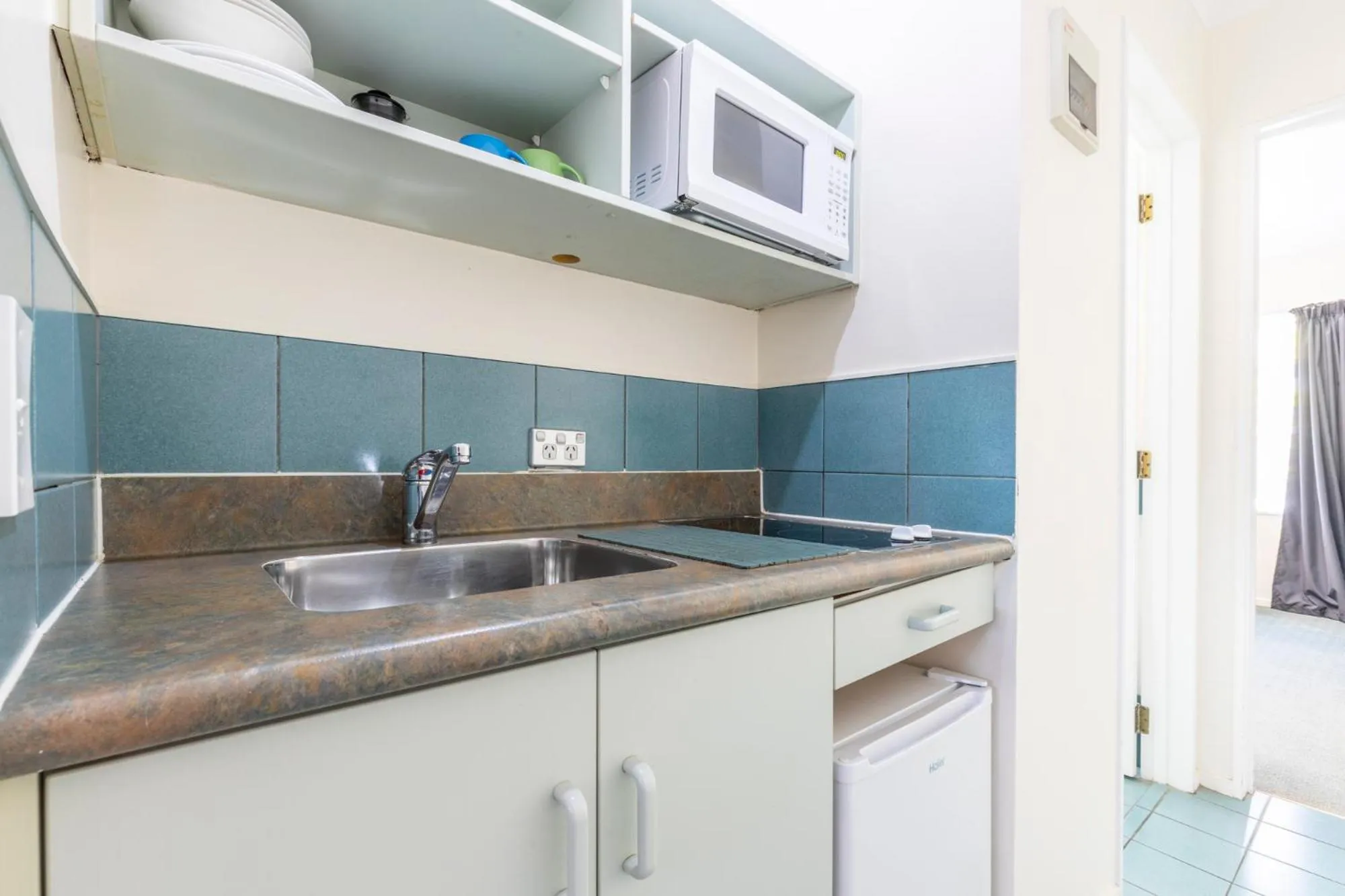 Kitchen or kitchenette in ASURE PRINCE motor lodge