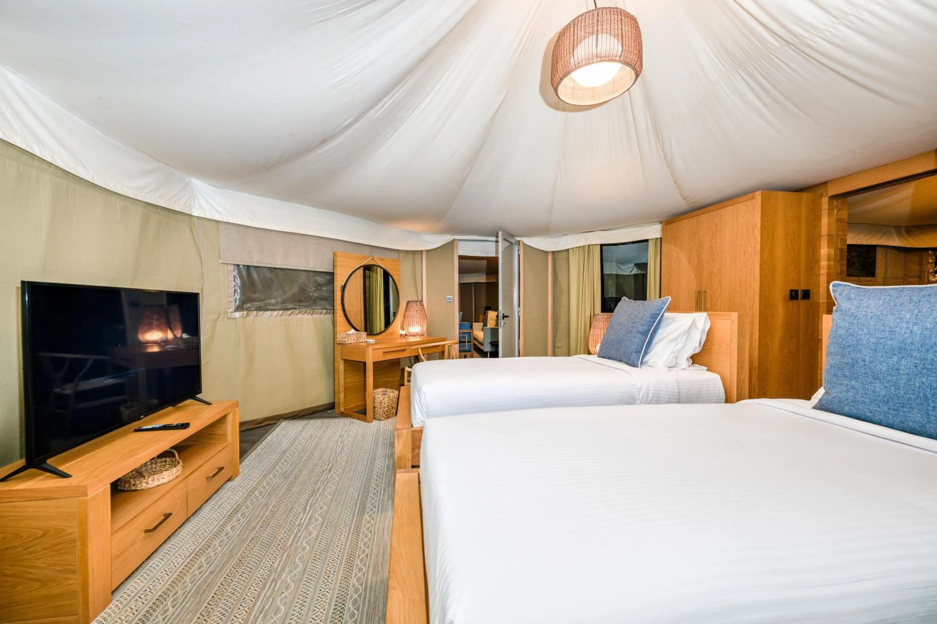 Bed in Kingfisher Retreat by Sharjah Collection