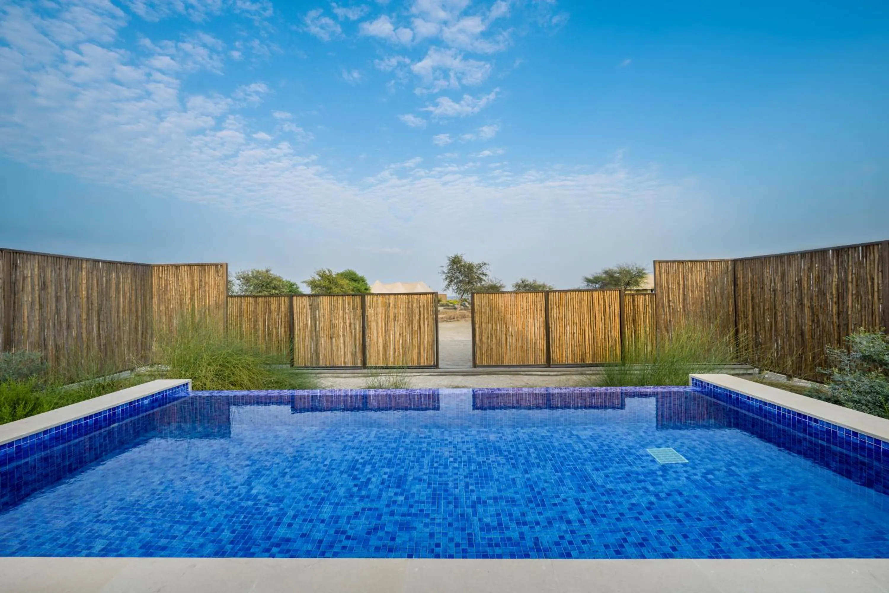 Pool view in Kingfisher Retreat by Sharjah Collection