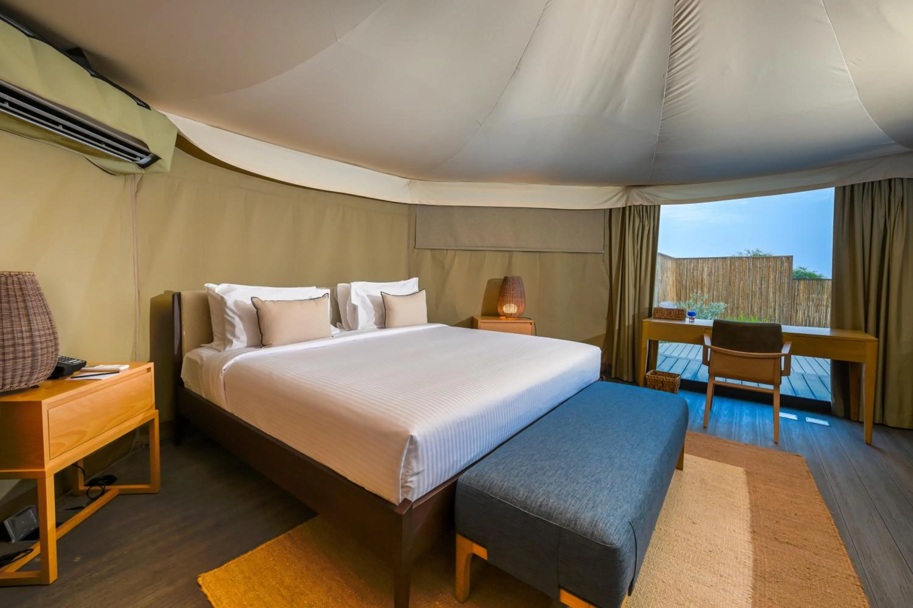 Bed in Kingfisher Retreat by Sharjah Collection