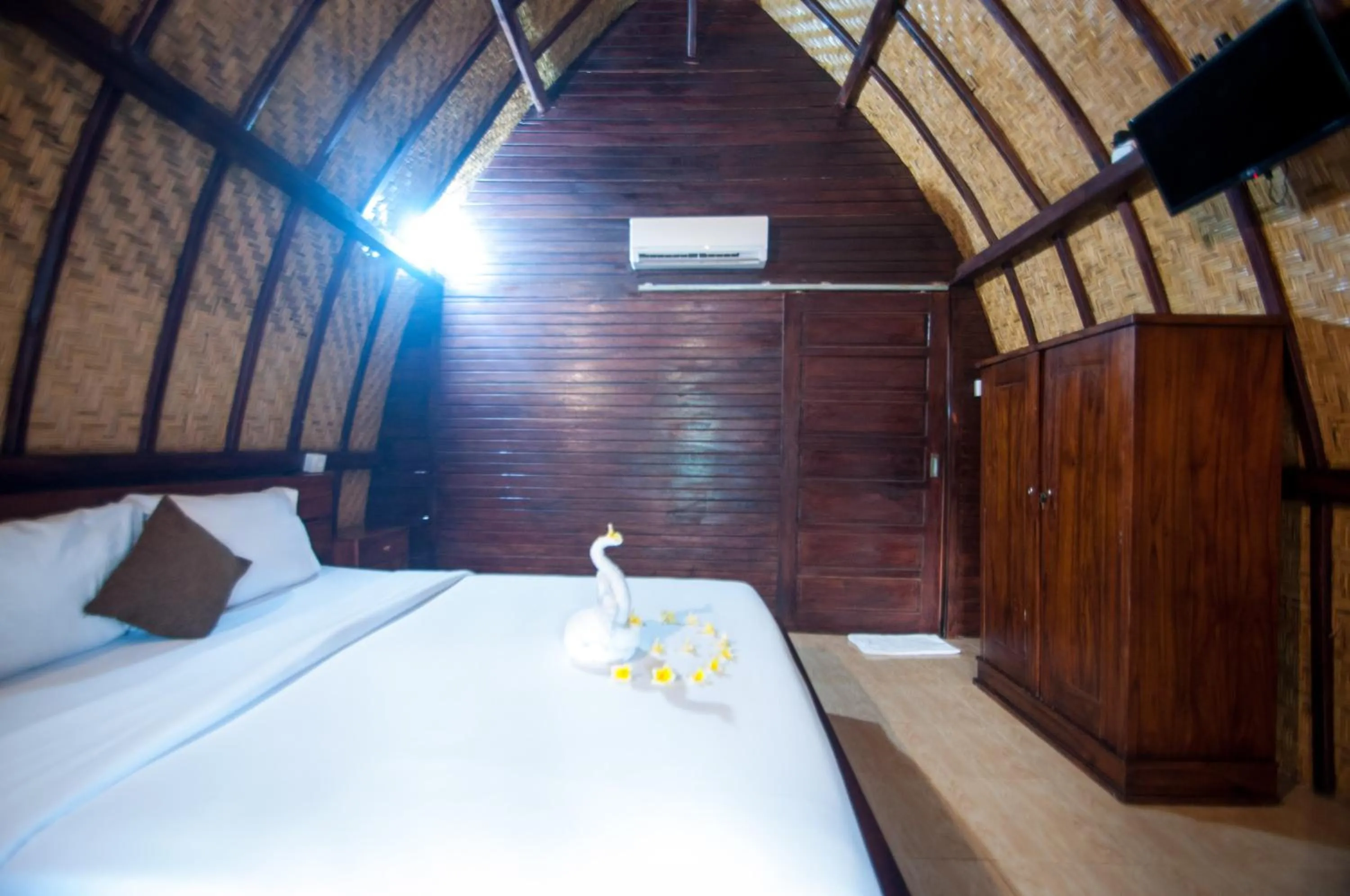 Bed in Jona Bungalow