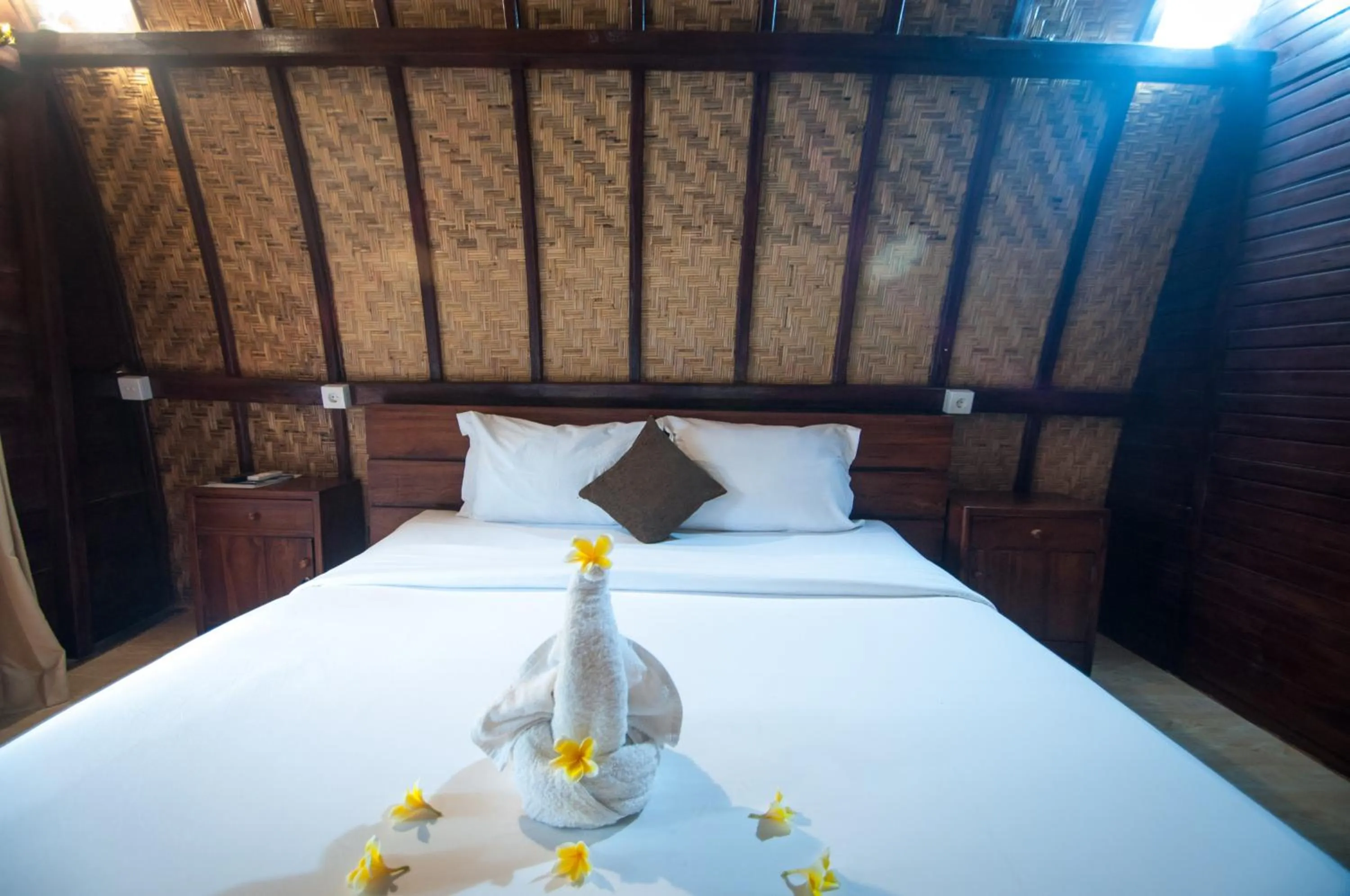 Bed in Jona Bungalow