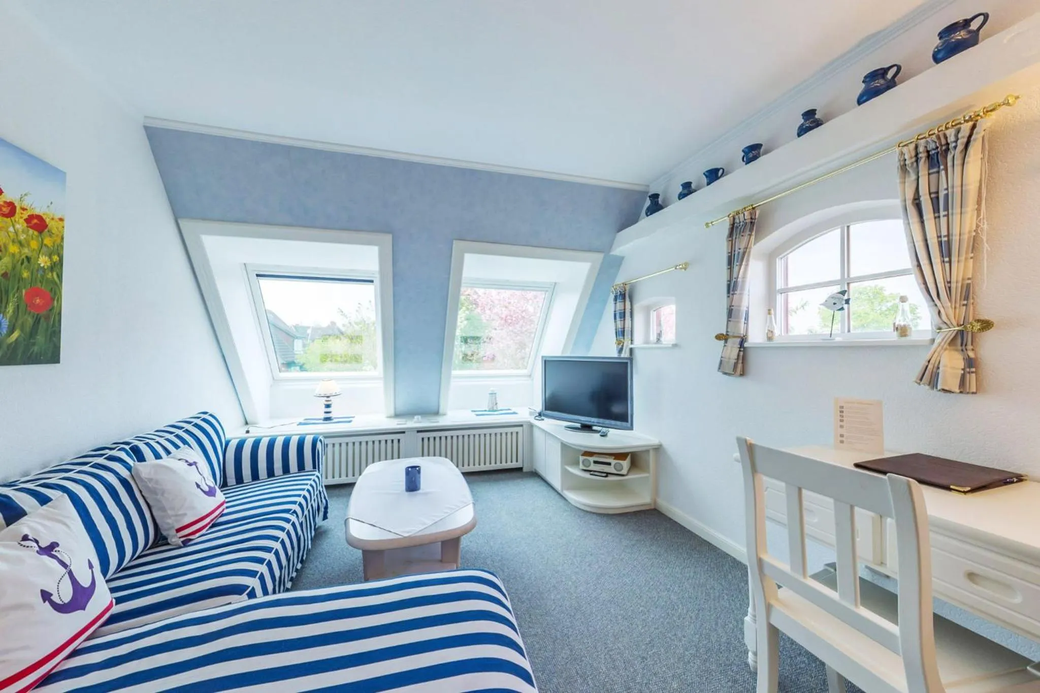 Living room, Bed in Inselhotel Arfsten