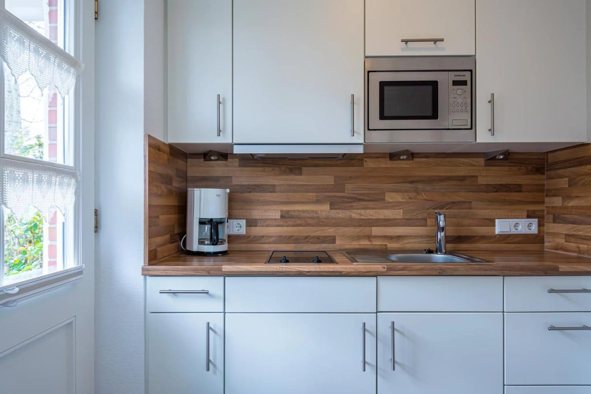 Kitchen or kitchenette in Inselhotel Arfsten