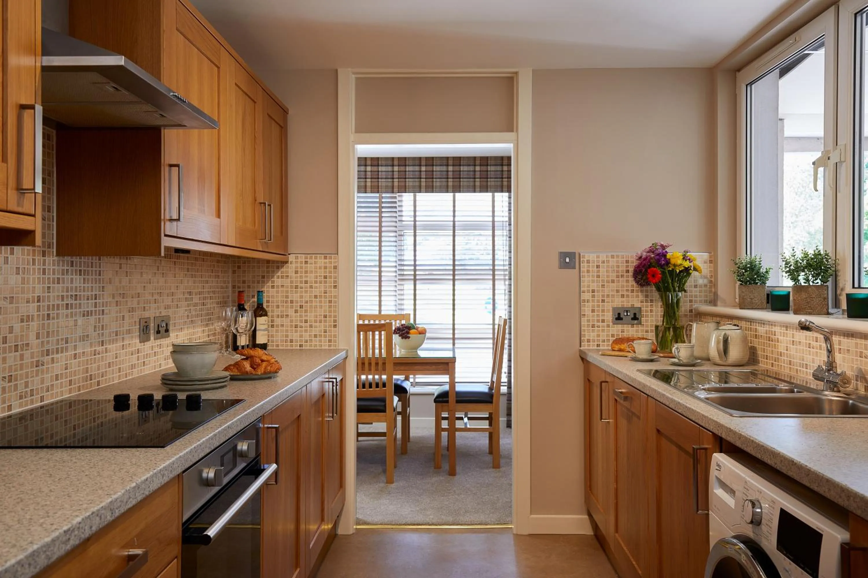 Kitchen or kitchenette in Macdonald Woodland Lodges at Macdonald Aviemore Resort