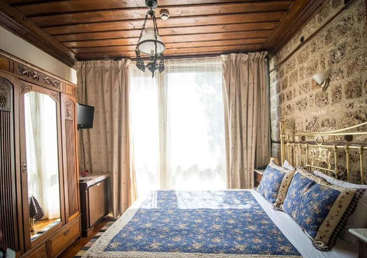 Bed in Hagiati Guesthouse - Edessa Cozy Mountain Retreat