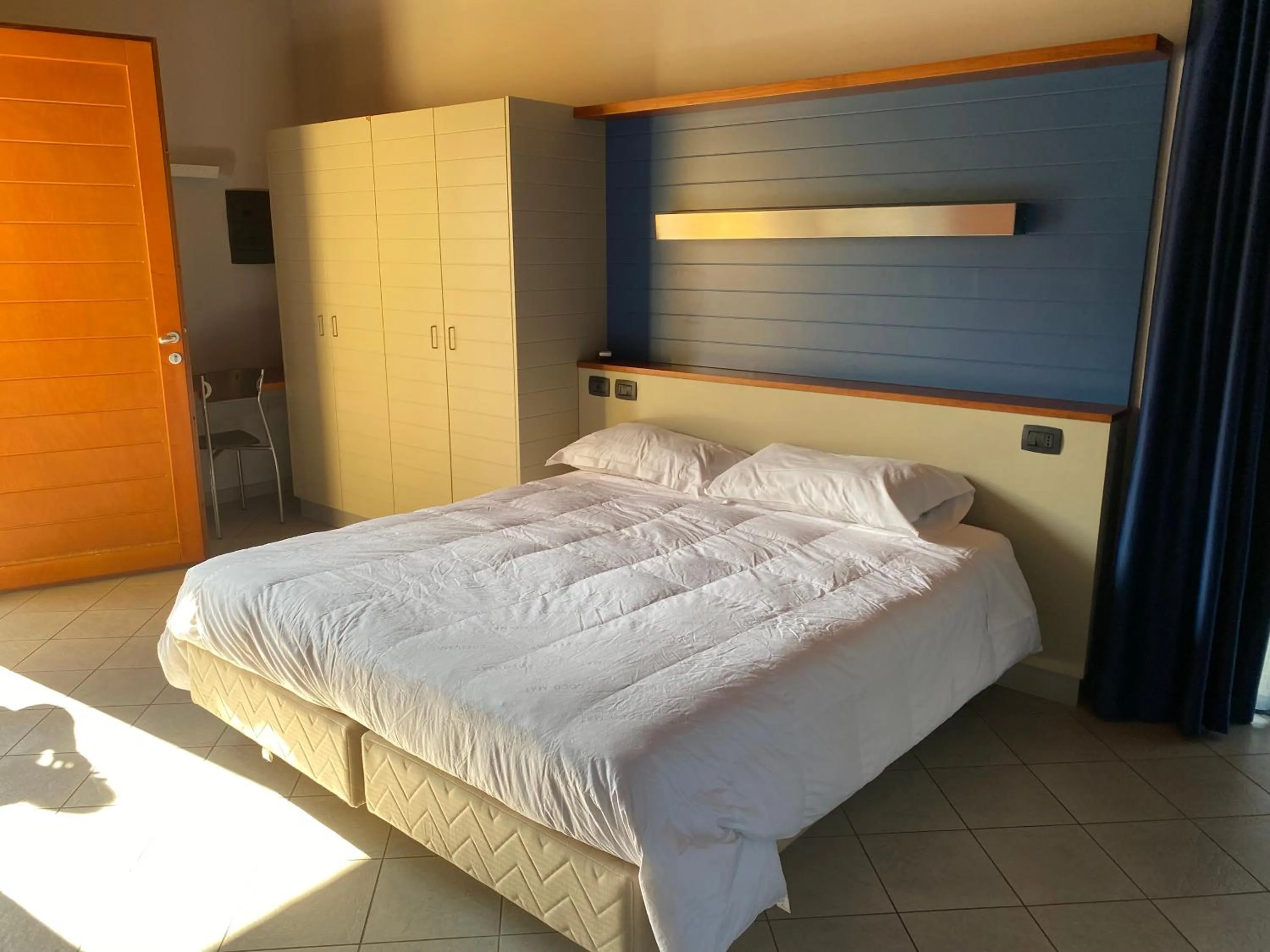 Bed in Albavillage Rooms & Camping