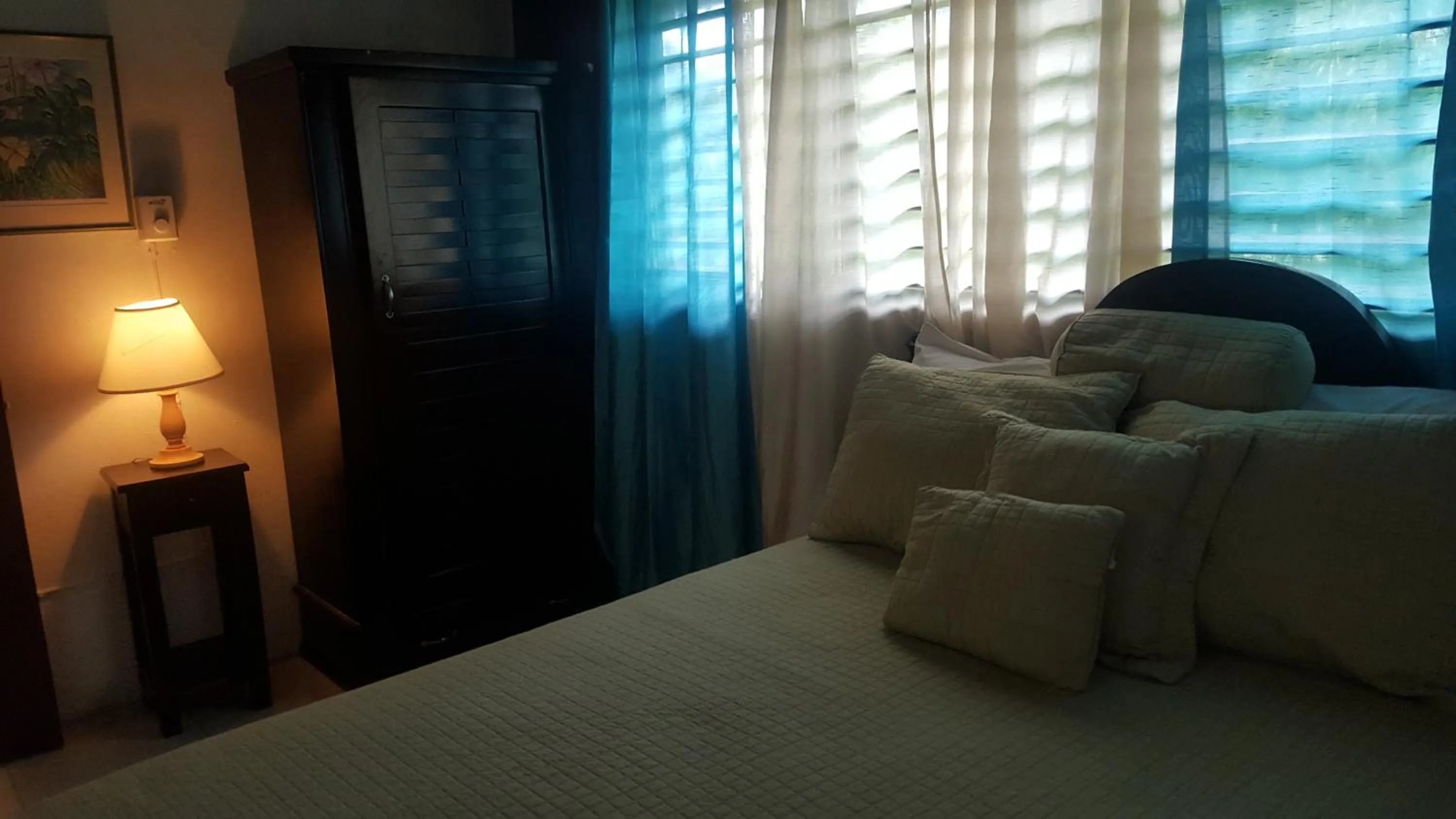 Bed in Firefly Beach Cottages