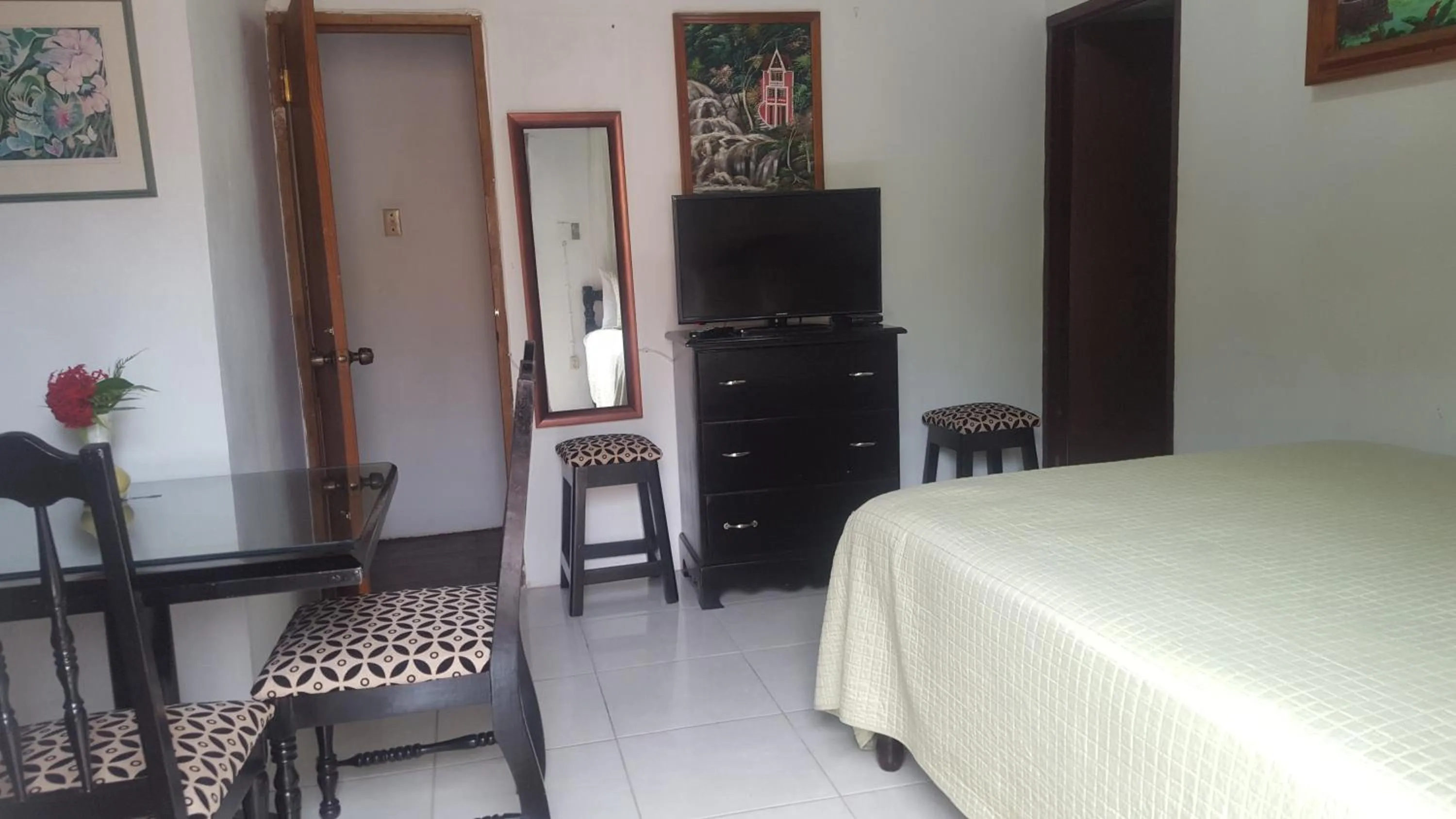 Bed in Firefly Beach Cottages