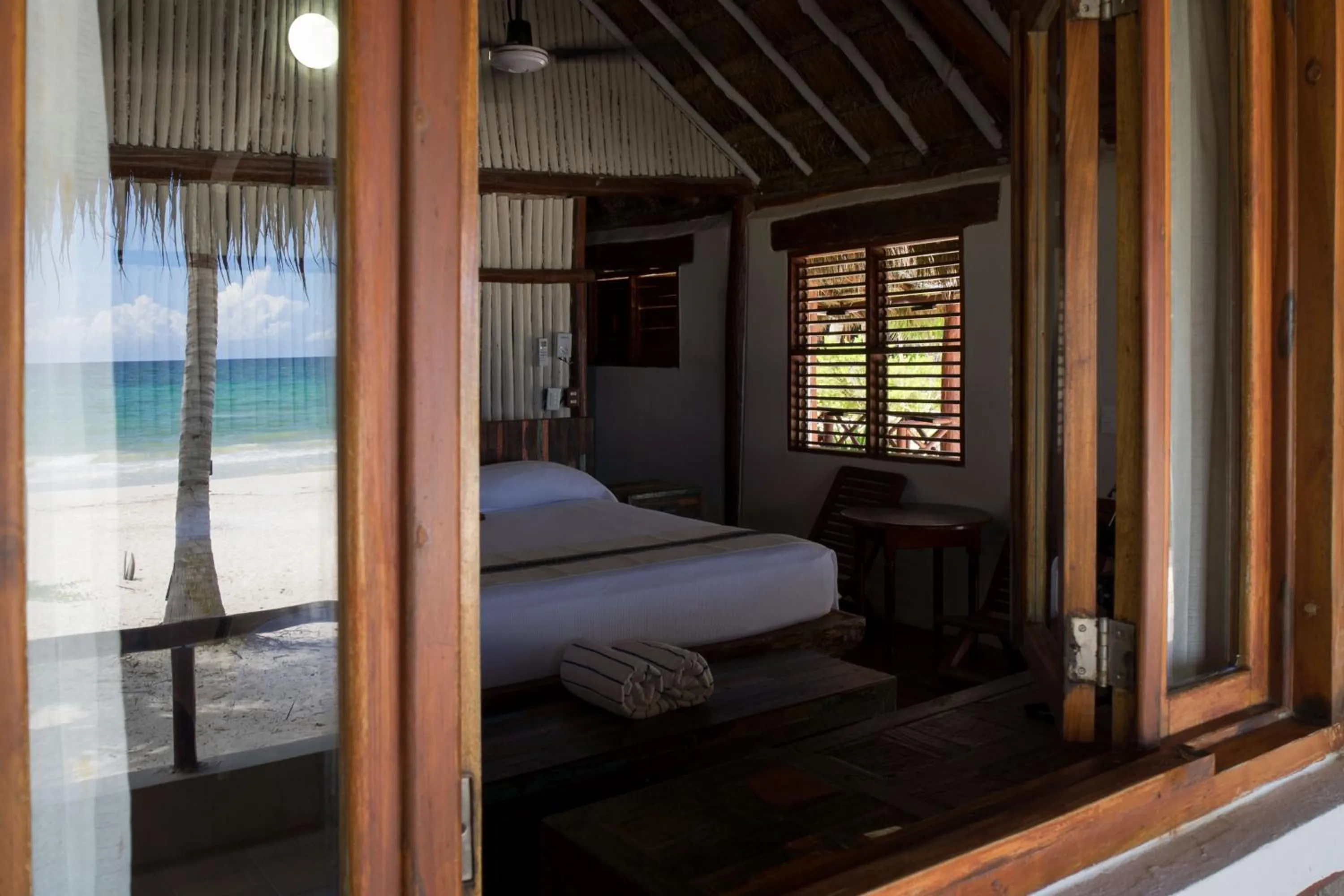 Bed in BT Live Tulum located at the party zone