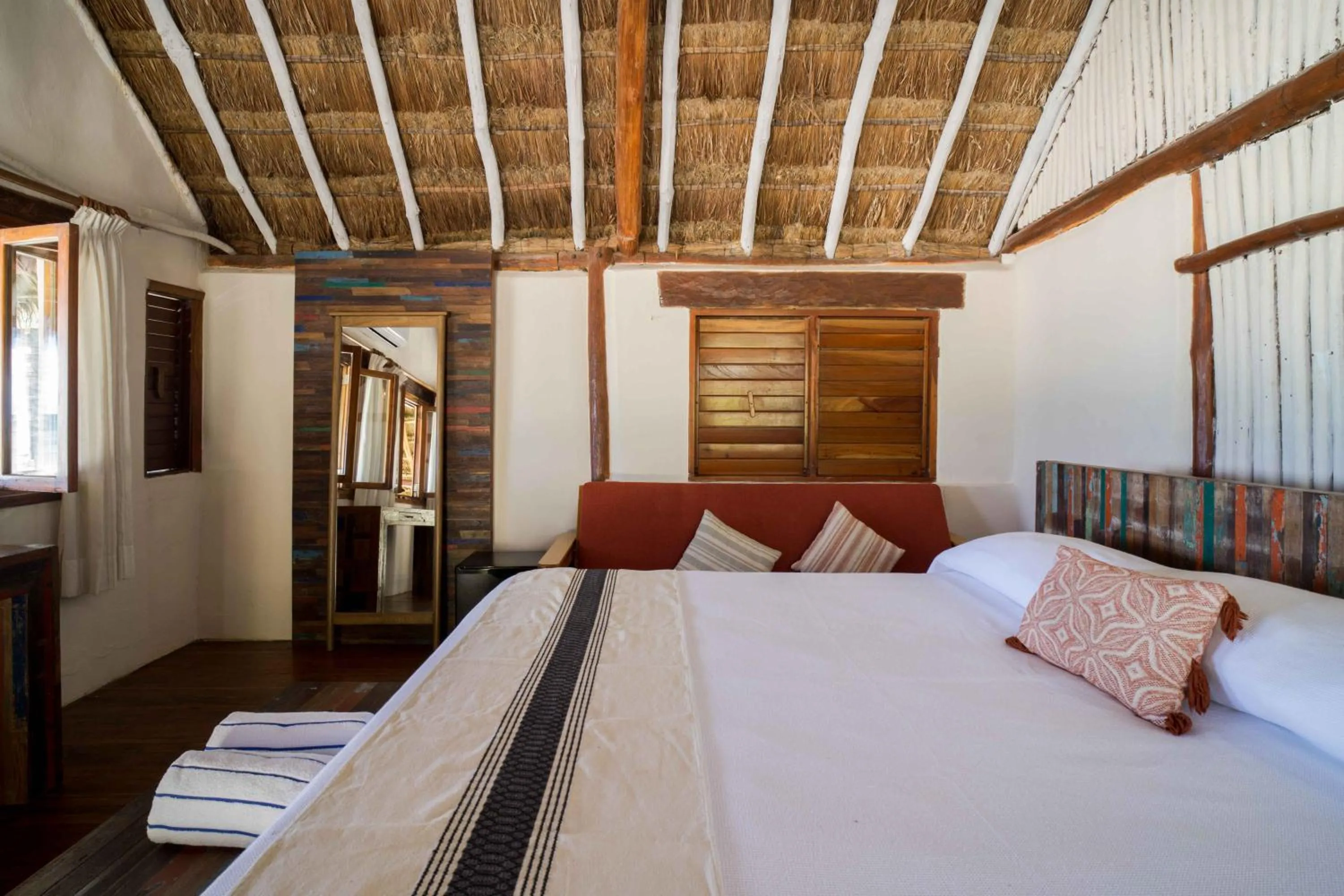 Bed in BT Live Tulum located at the party zone