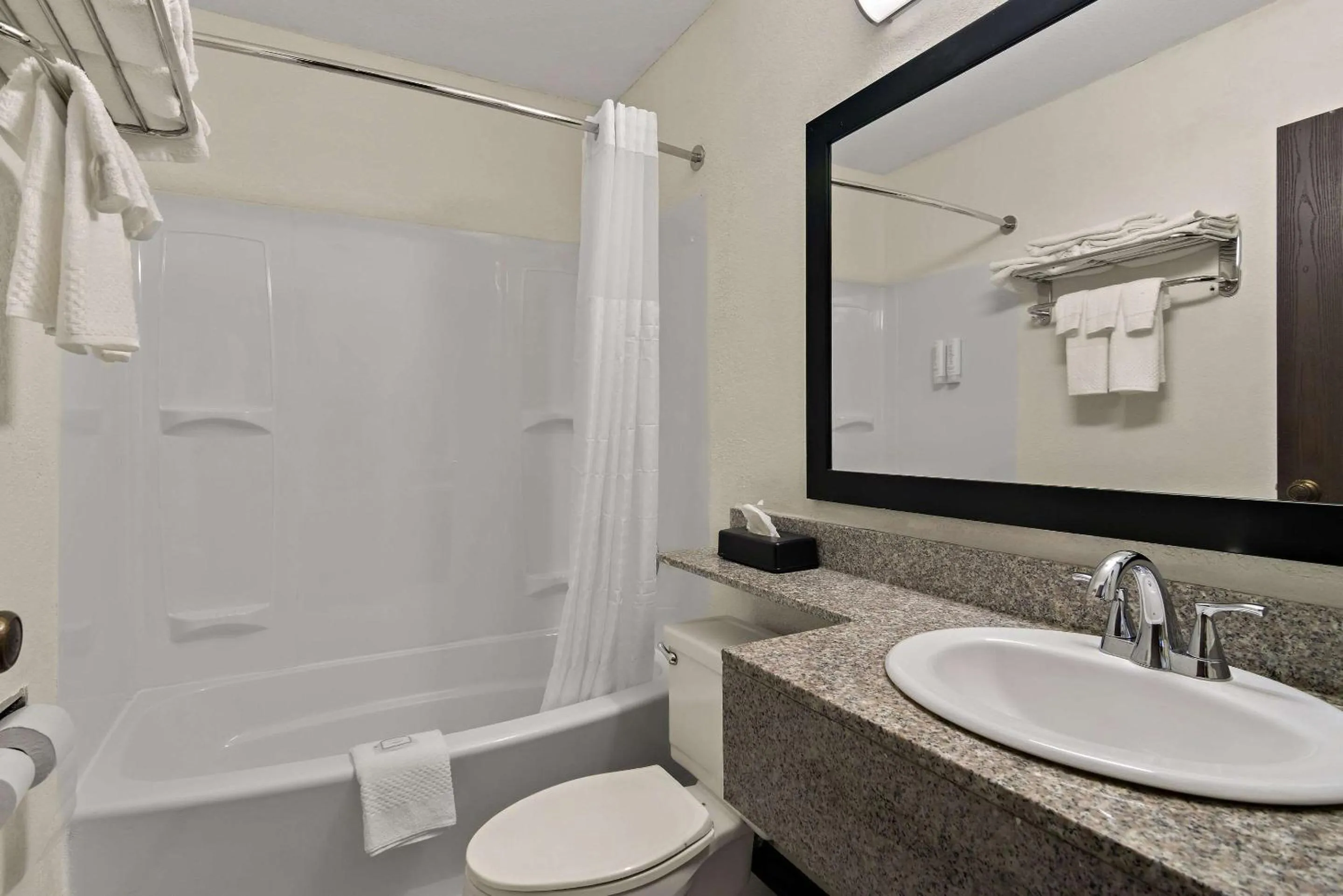 Bedroom in Clarion Pointe Bloomington-Normal near I-55 and University