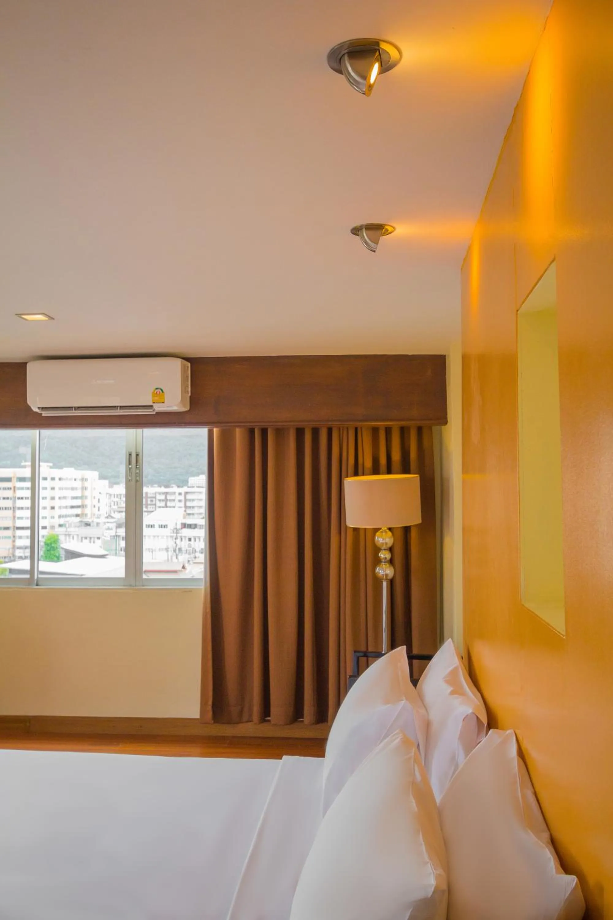 air conditioner, Bed in Mayflower Grande Chiang Mai