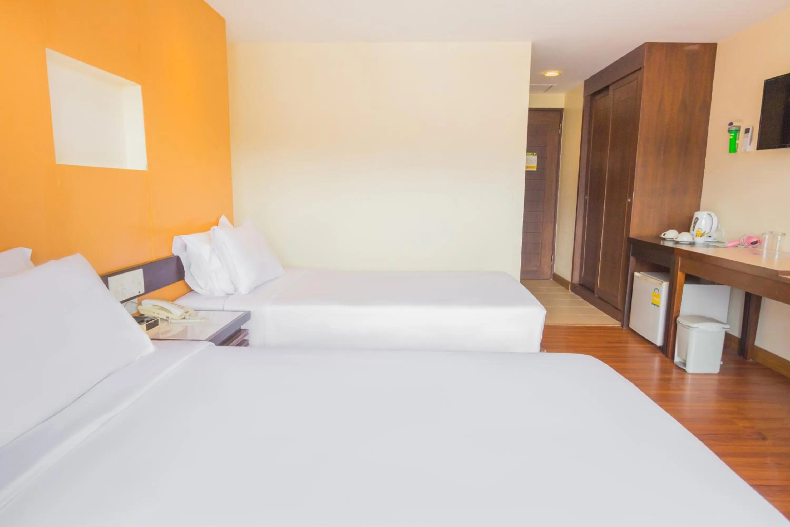 Bed in Mayflower Grande Chiang Mai