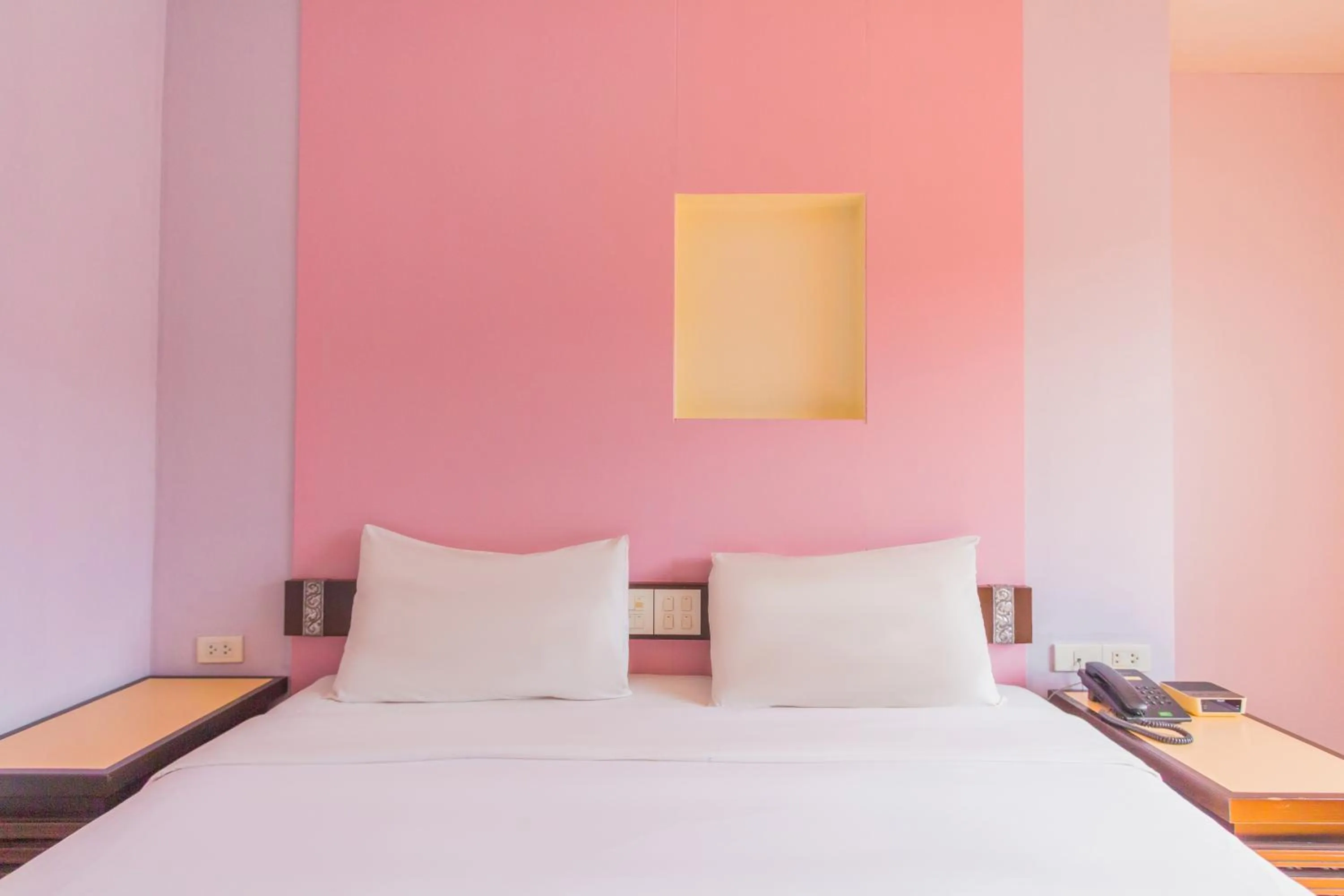 Bed in Mayflower Grande Chiang Mai