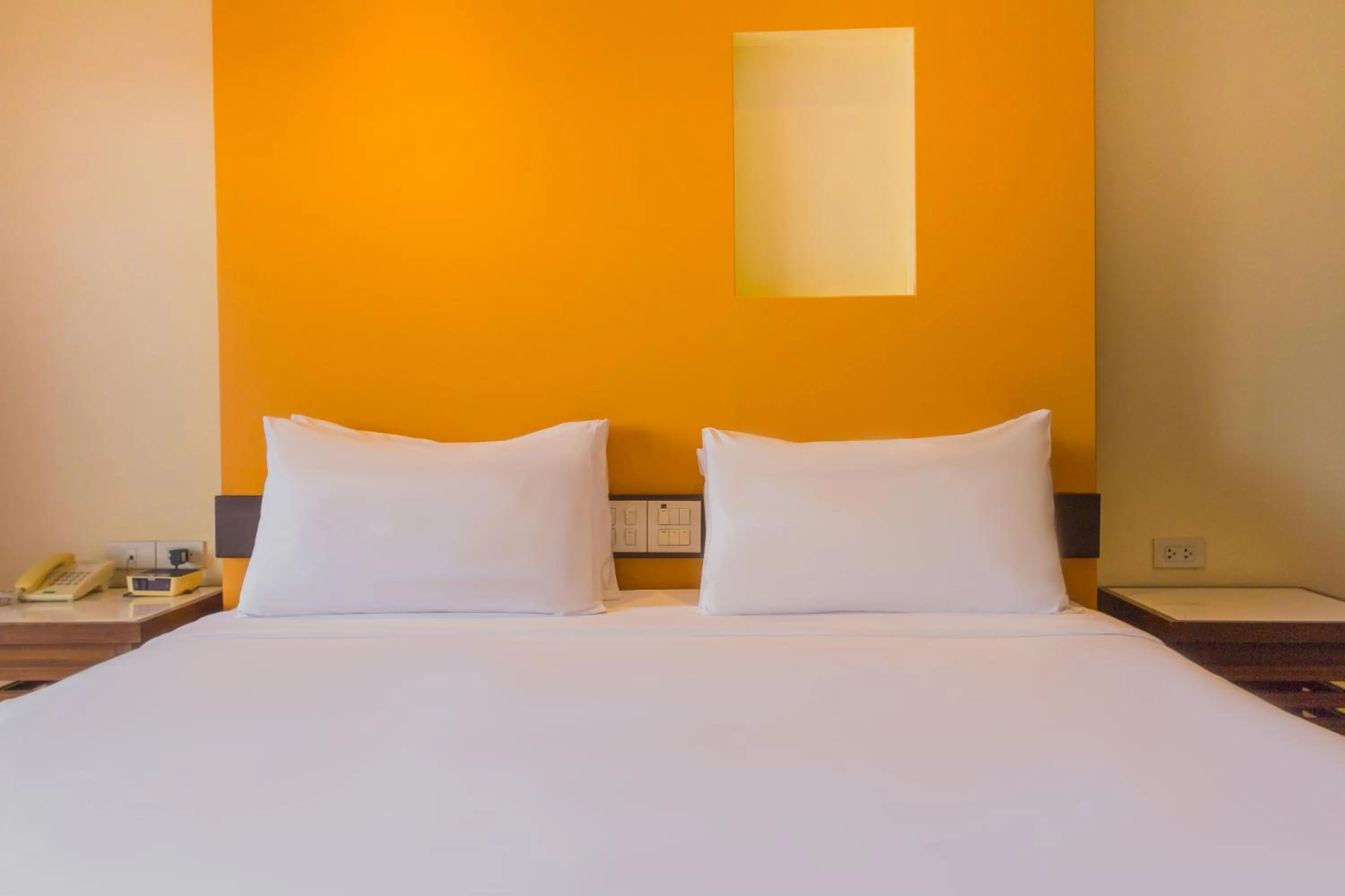 Bed in Mayflower Grande Chiang Mai