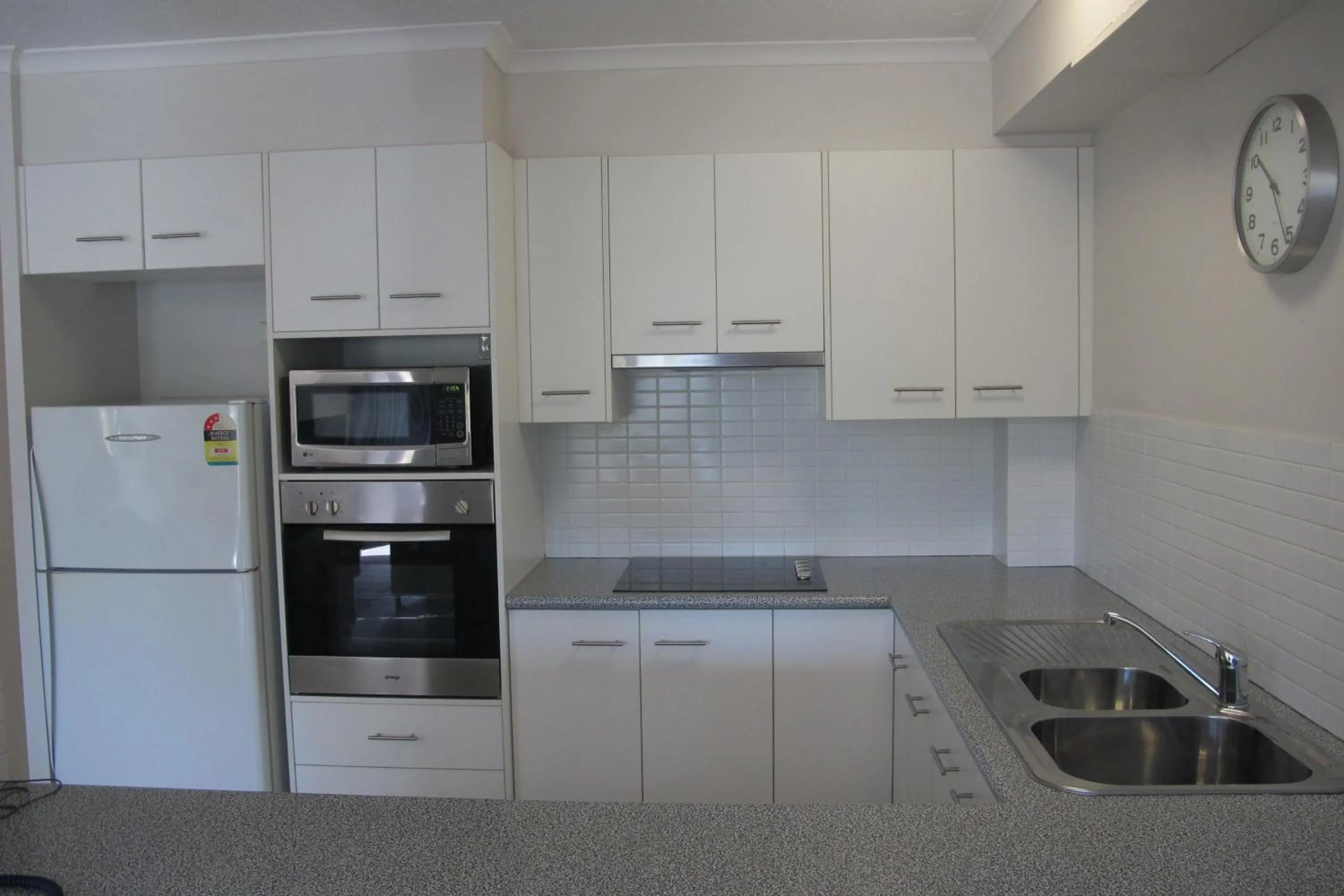 Kitchen or kitchenette in Grangewood Court Apartments