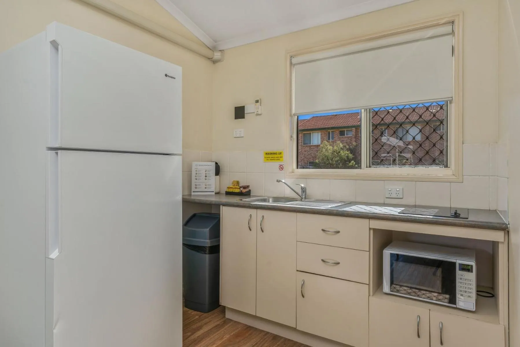Kitchen or kitchenette in Caboolture Central Motor Inn, Sure Stay Collection by BW
