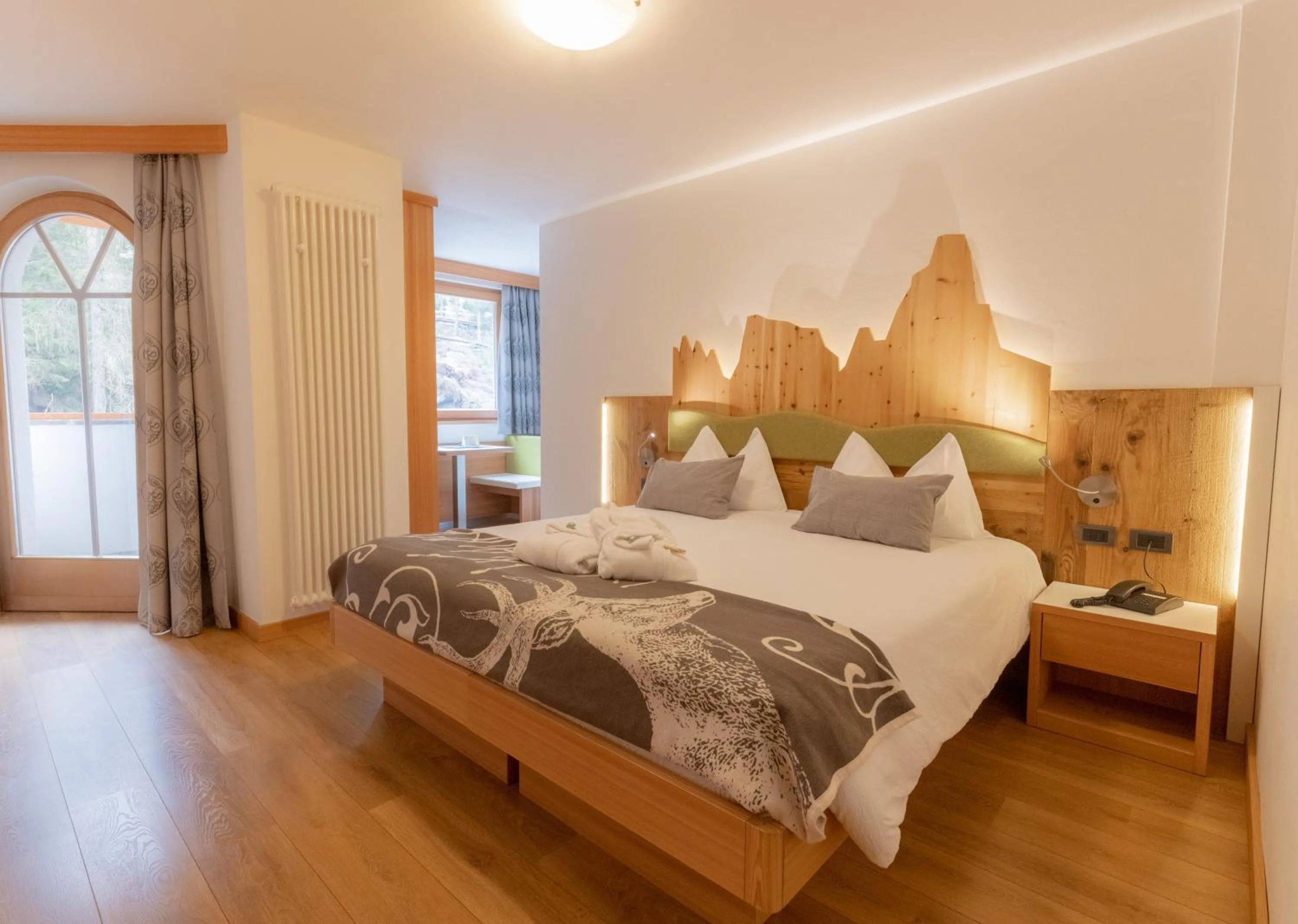 Bed in Berghotel Miramonti