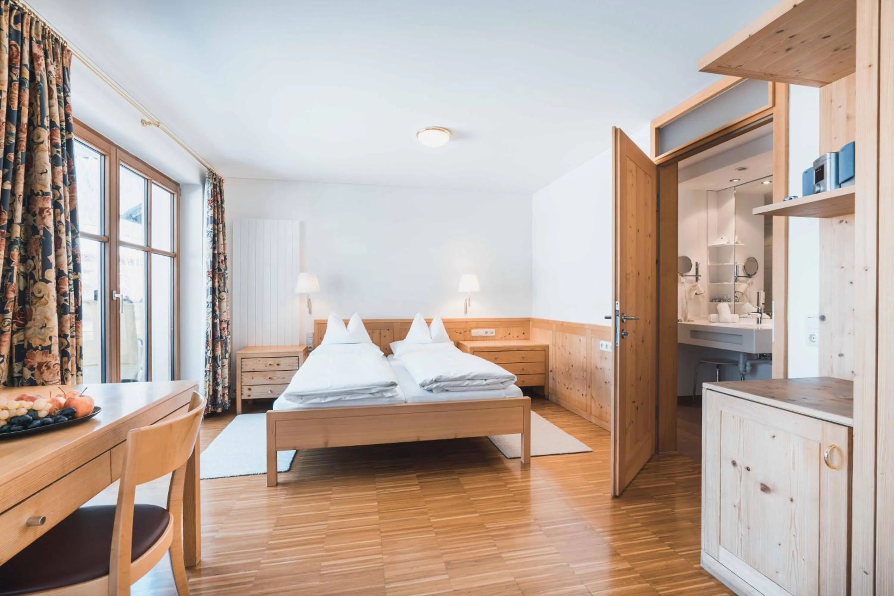 Photo of the whole room, Bed in Felbermayer Hotel & AlpineSpa-Montafon