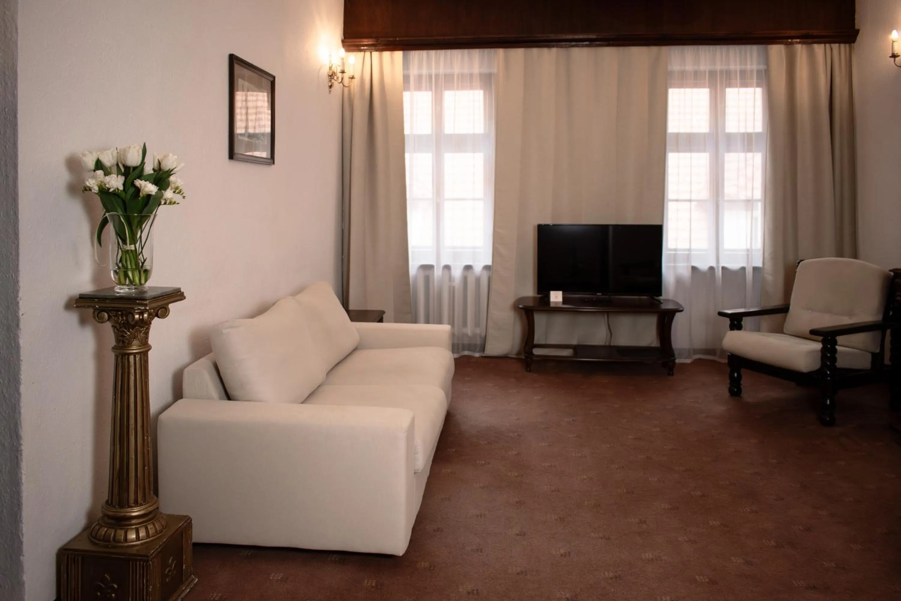 Communal lounge/ TV room in Hotel Dwór Polski