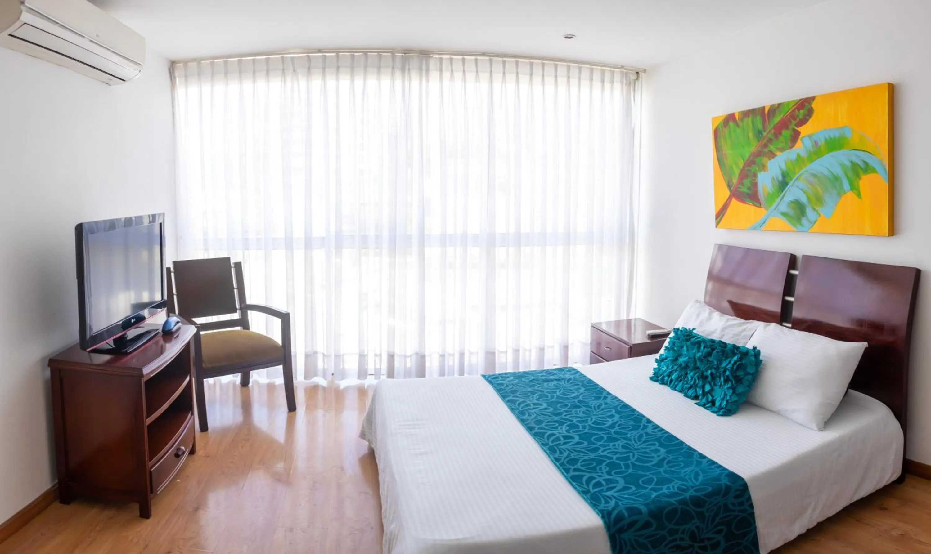 Bed in Monterosa Apartamentos Amoblados