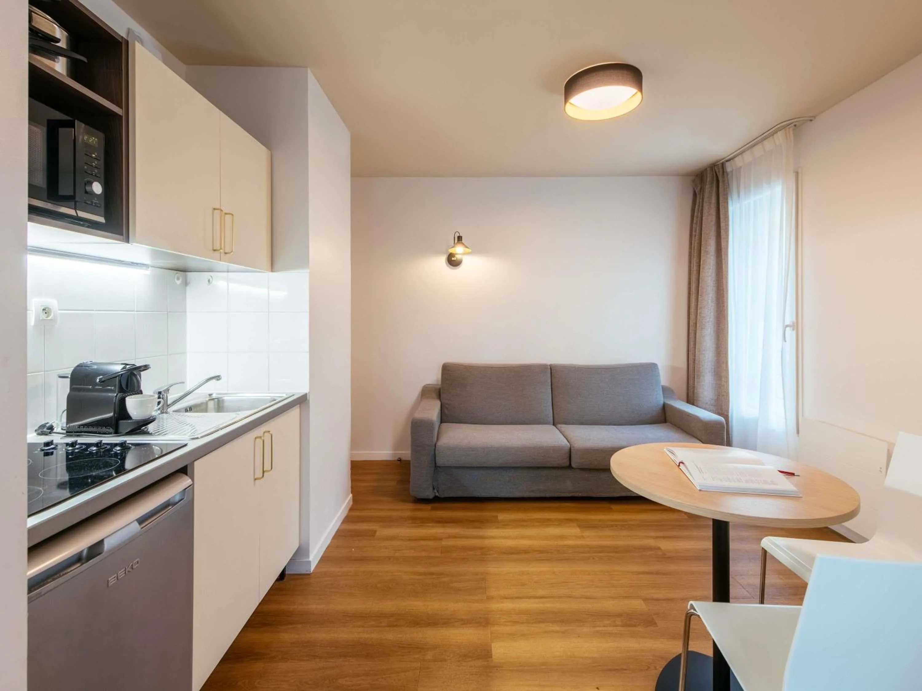 Bedroom in Aparthotel Adagio Access Paris Asnières