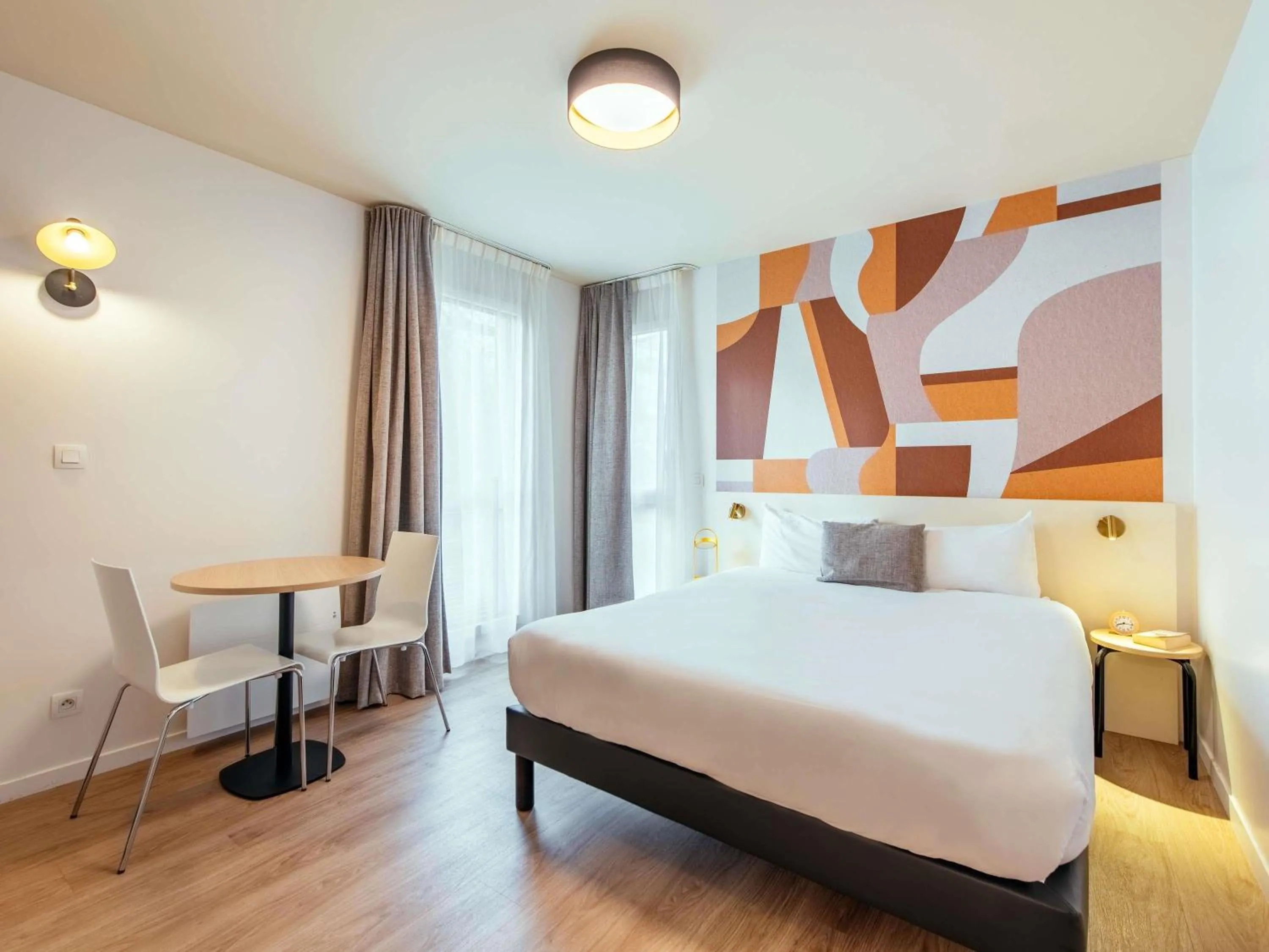 Bedroom, Bed in Aparthotel Adagio Access Paris Asnières