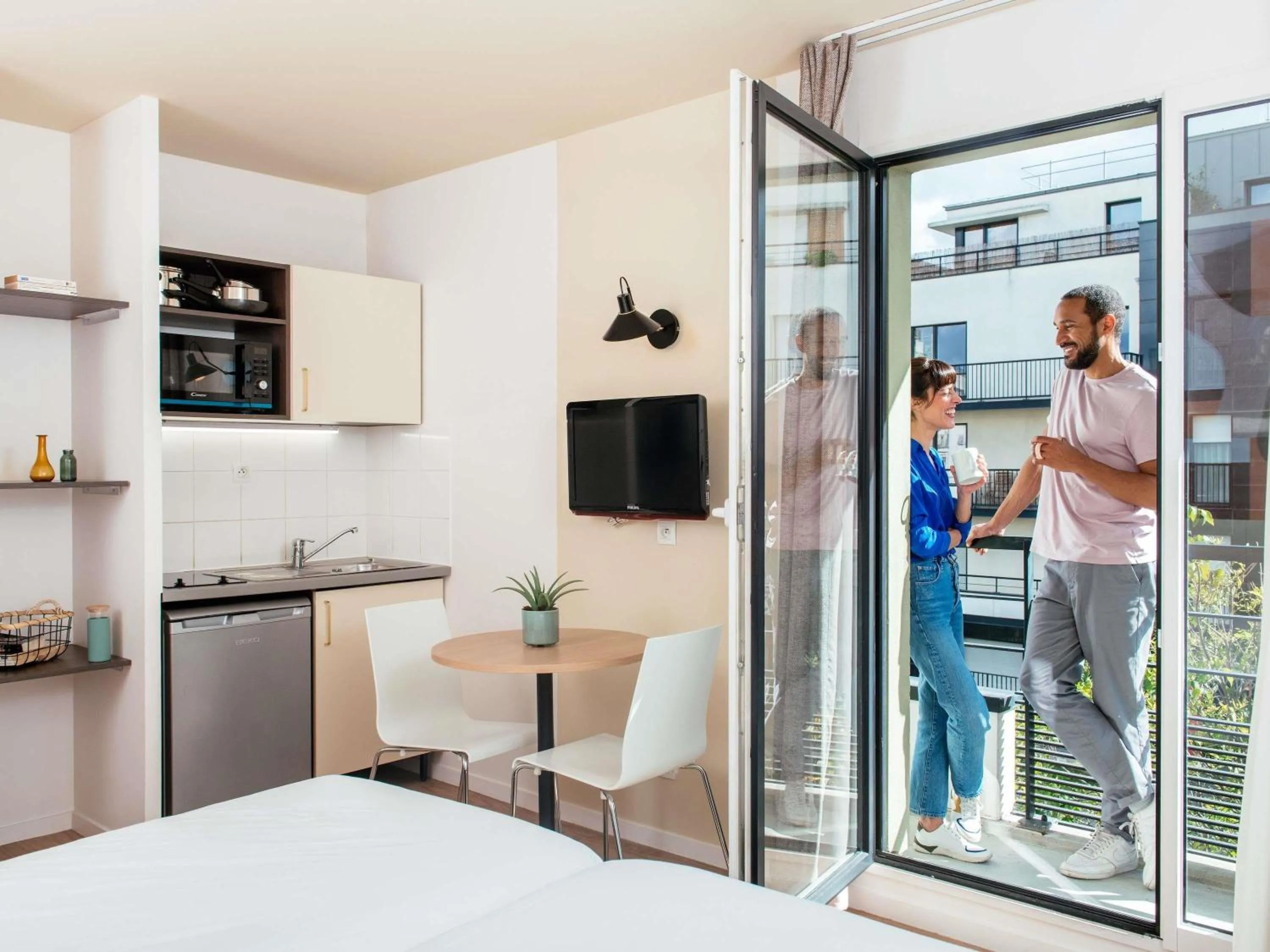 Bedroom in Aparthotel Adagio Access Paris Asnières