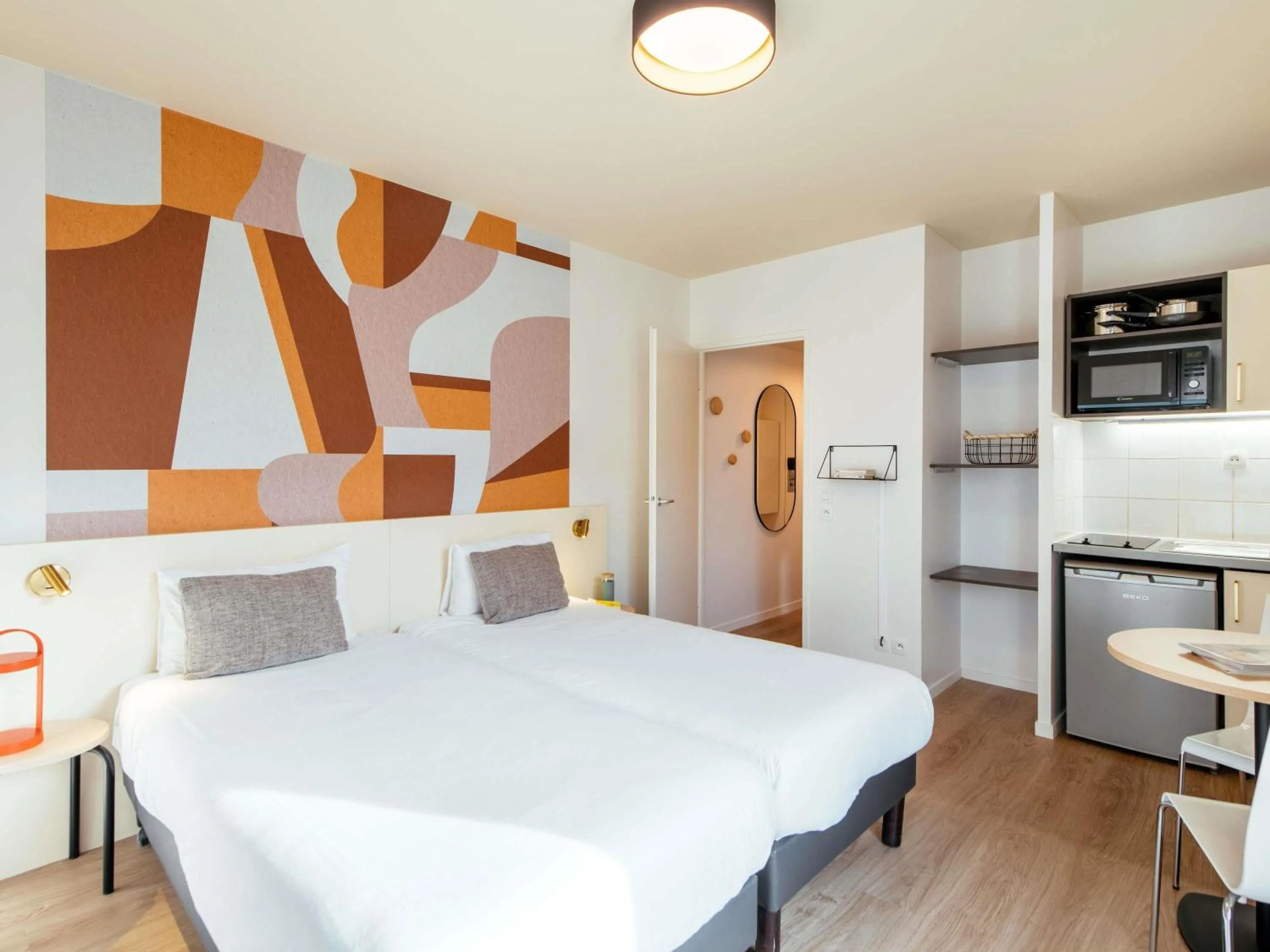 Bedroom, Bed in Aparthotel Adagio Access Paris Asnières