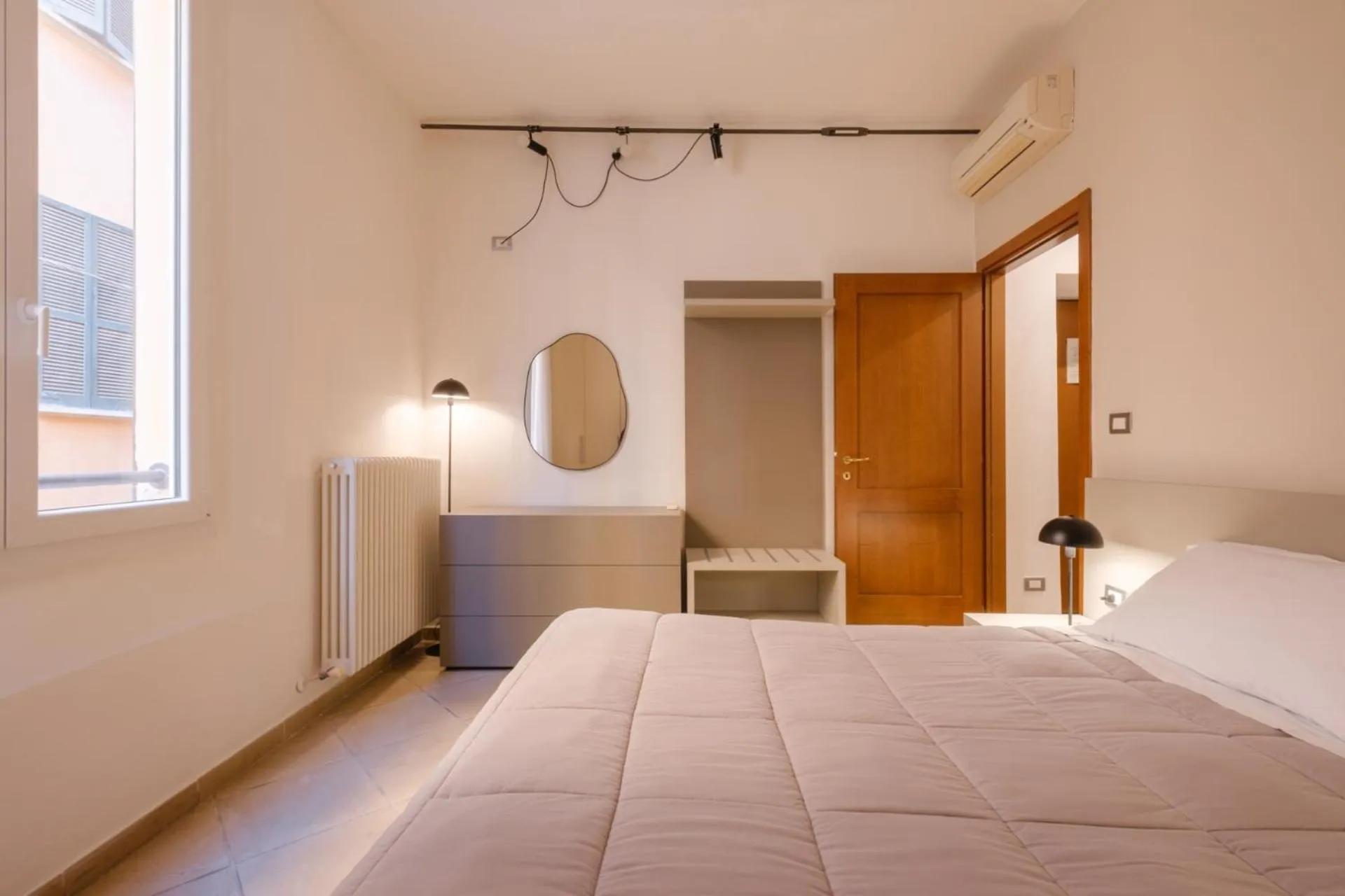 Bed in Residenza Ariosto by Studio Vita