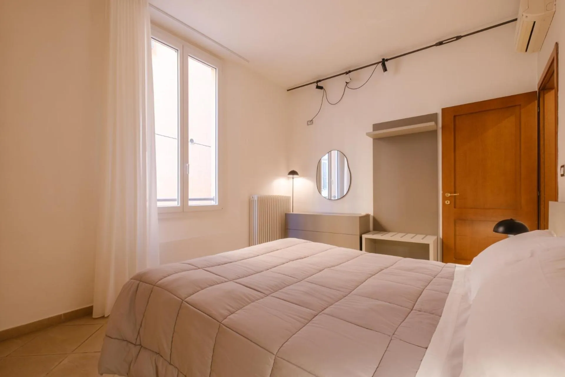 Bed in Residenza Ariosto by Studio Vita