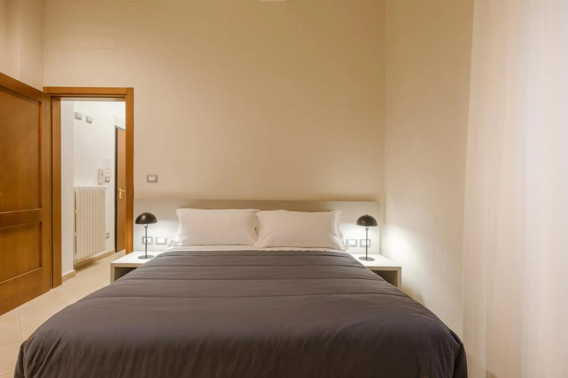 Bed in Residenza Ariosto by Studio Vita