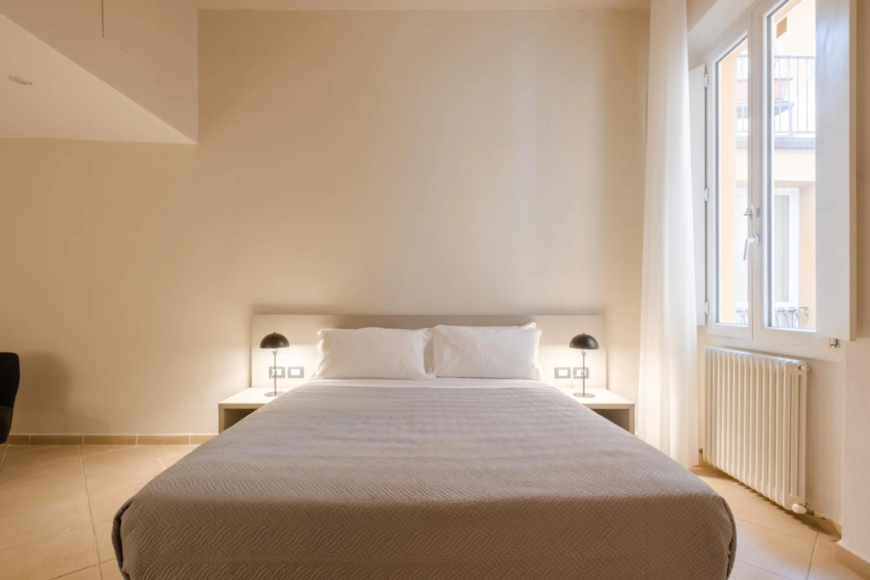 Bed in Residenza Ariosto by Studio Vita