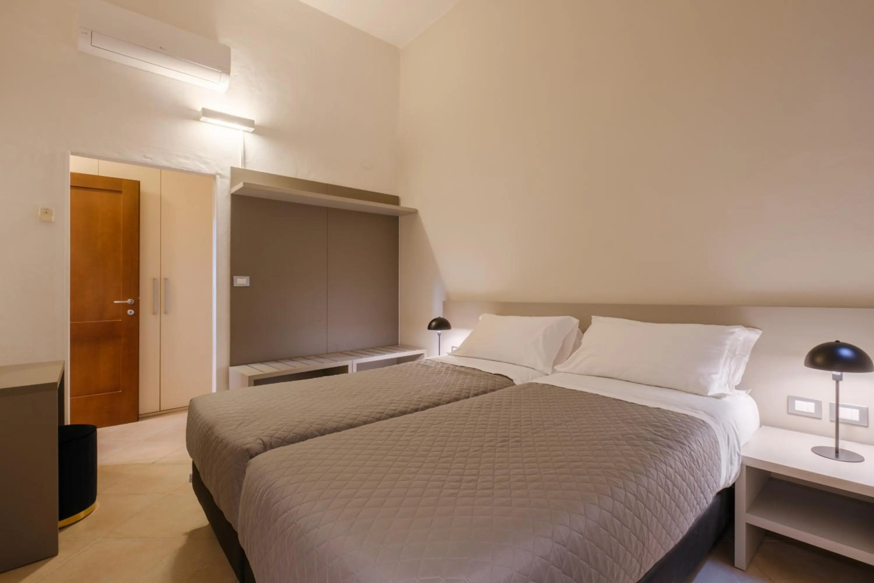 Bed in Residenza Ariosto by Studio Vita