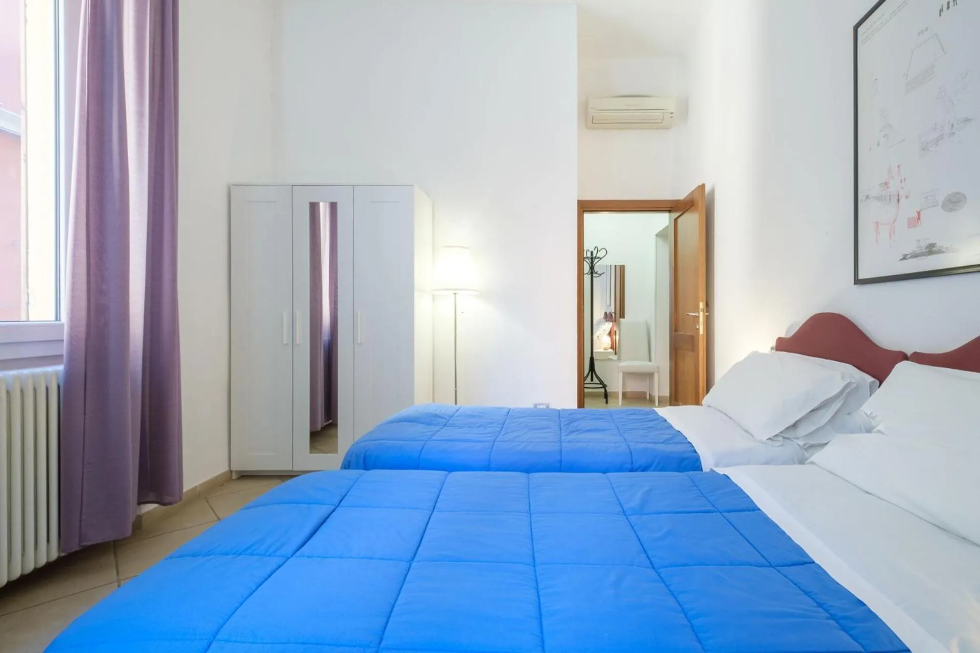 Bed in Residenza Ariosto by Studio Vita