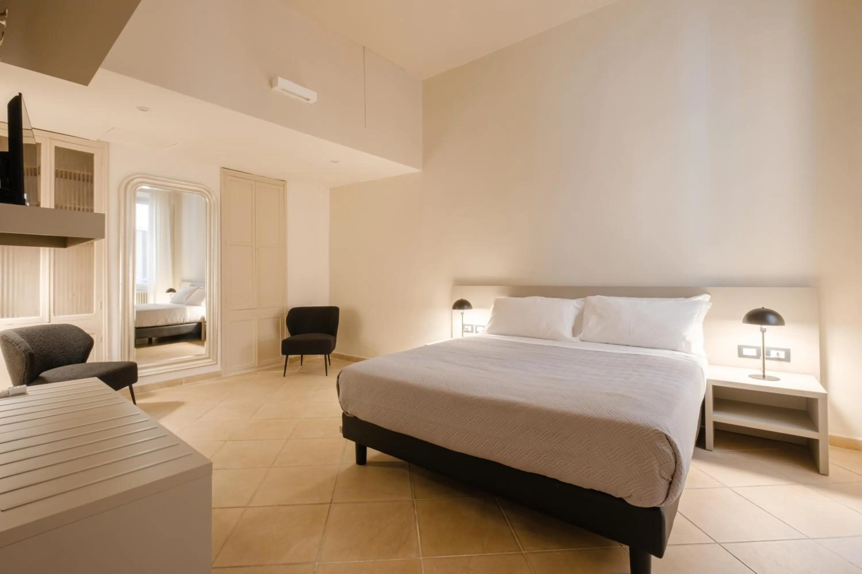 Bed in Residenza Ariosto by Studio Vita